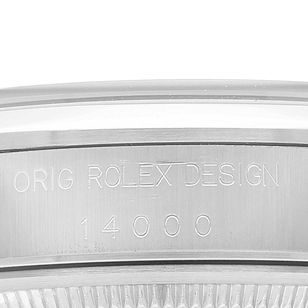 The image shows a close-up view of the case back of a Rolex Air-King 14000 Men's Stainless Steel Grey Dial 14000 Men's Stainless Steel Grey Dial watch, focusing on the engraved serial number and "ORIG ROLEX DESIGN" text.