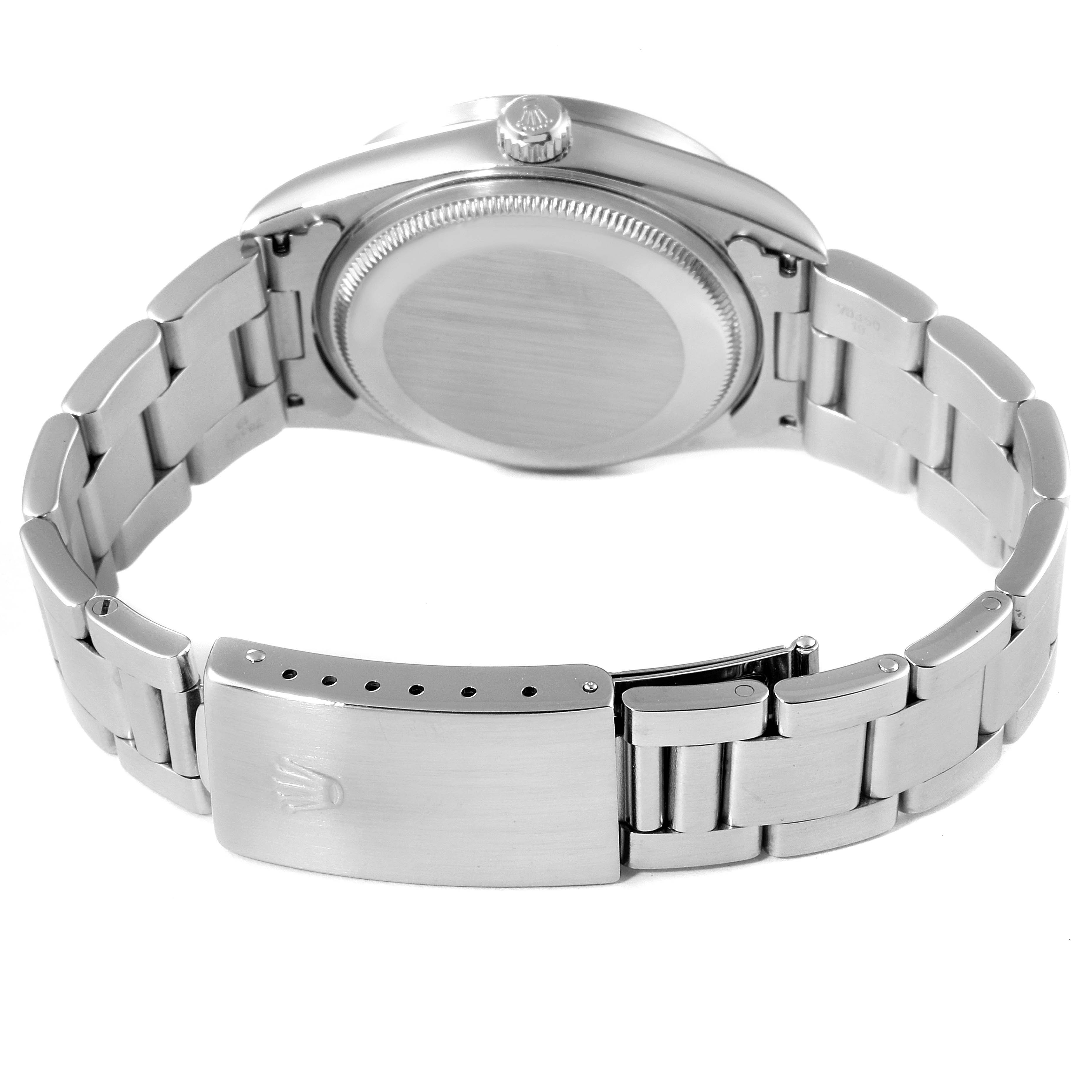 This image shows the back view of a Rolex Air-King 14010 Men's Stainless Steel Silver Dial 14010 Men's Stainless Steel Silver Dial watch, highlighting the bracelet, clasp, and case back.