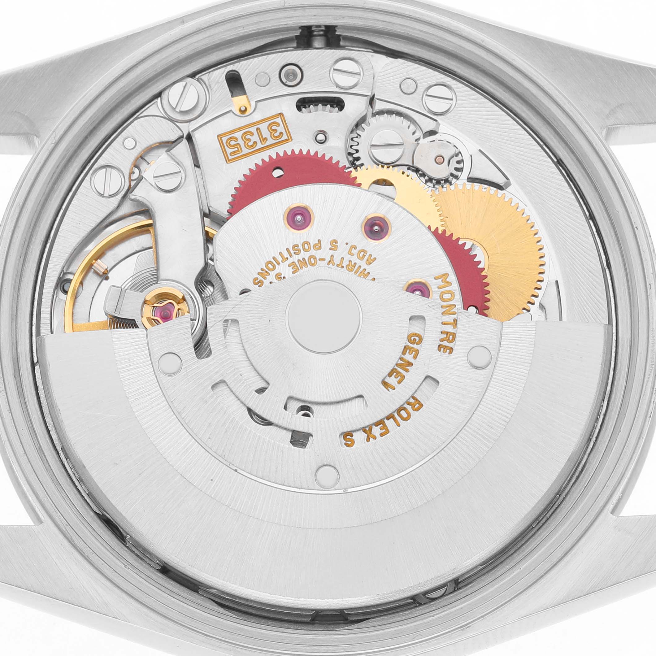 The image shows the internal mechanism of a Rolex Date Men's Stainless Steel Pink Dial watch from a rear angle, highlighting gears and components.