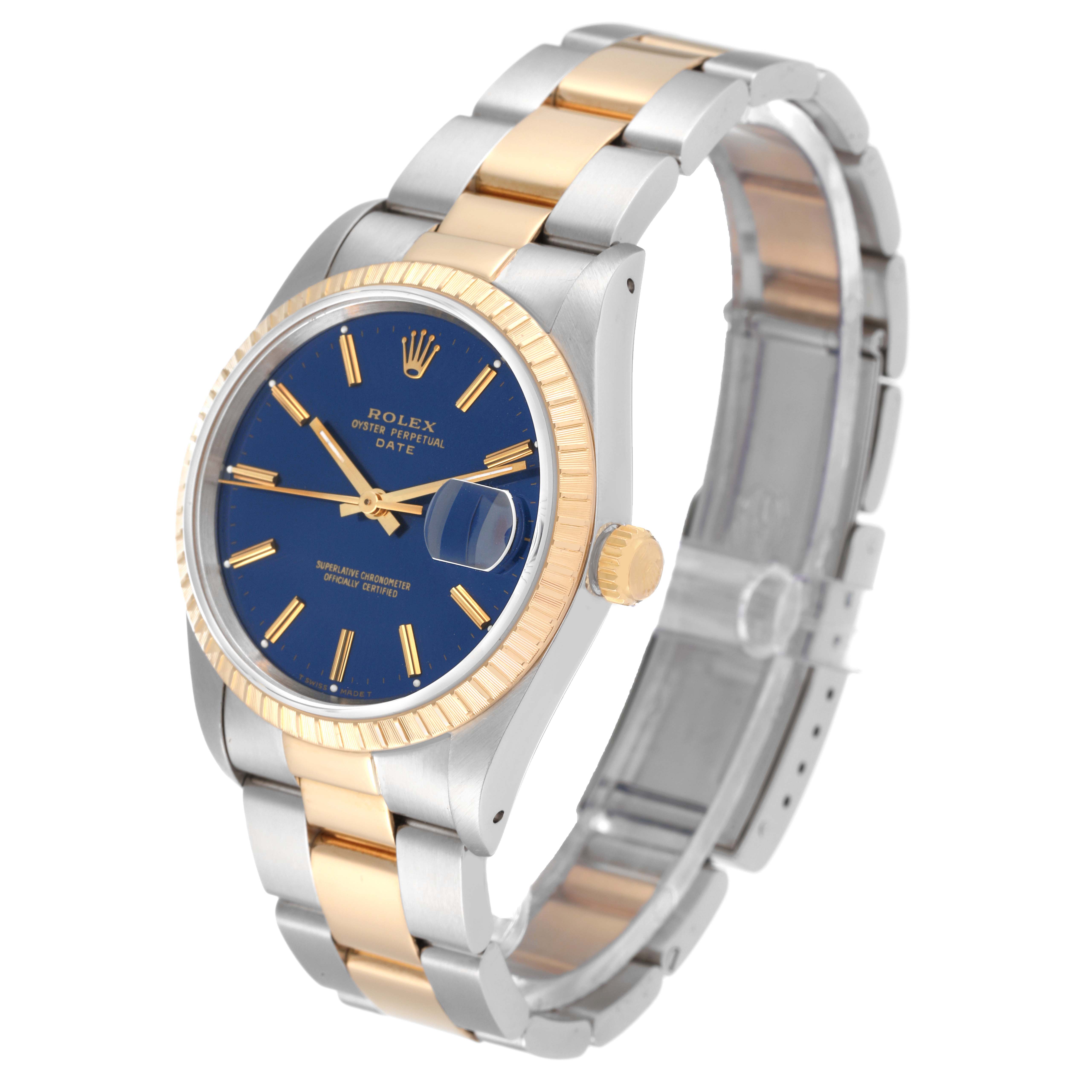 This image shows a Rolex Date 15223 Men's Steel and Gold (two tone) Blue Dial 15223 Men's Steel and Gold (two tone) Blue Dial model watch at an angled view, highlighting its blue dial, gold fluted bezel, and two-tone bracelet.