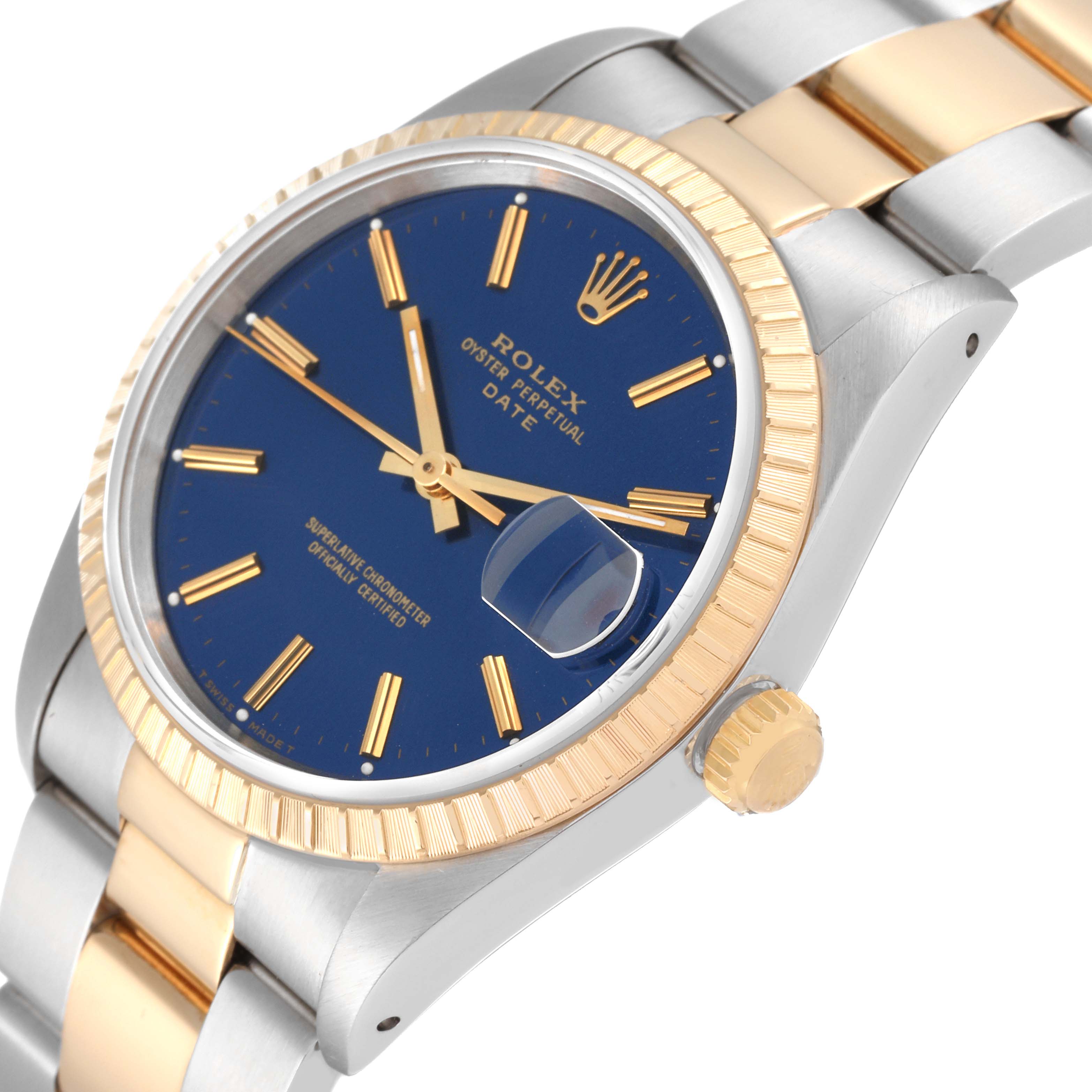 The image shows the Rolex Date 15223 Men's Steel and Gold (two tone) Blue Dial 15223 Men's Steel and Gold (two tone) Blue Dial model watch at an angled close-up, highlighting its dial, bezel, and part of the bracelet.
