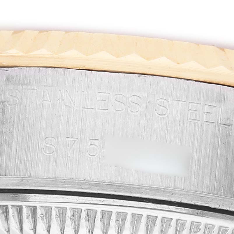 The image shows a close-up of the side of a Rolex Datejust 69173 Women's Stainless Steel Champagne Dial, highlighting the stainless steel casing and part of the bezel.