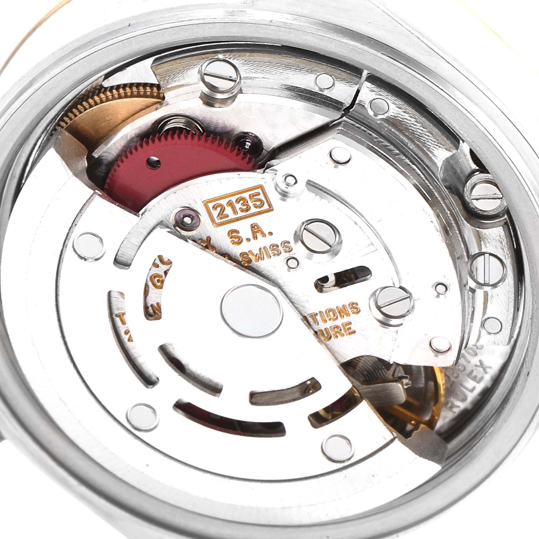 This image shows the internal movement mechanism of a Rolex Datejust 69173 Women's Steel and Gold (two tone) Black Dial 69173 Women's Steel and Gold (two tone) Black Dial watch, specifically the caliber 2135.