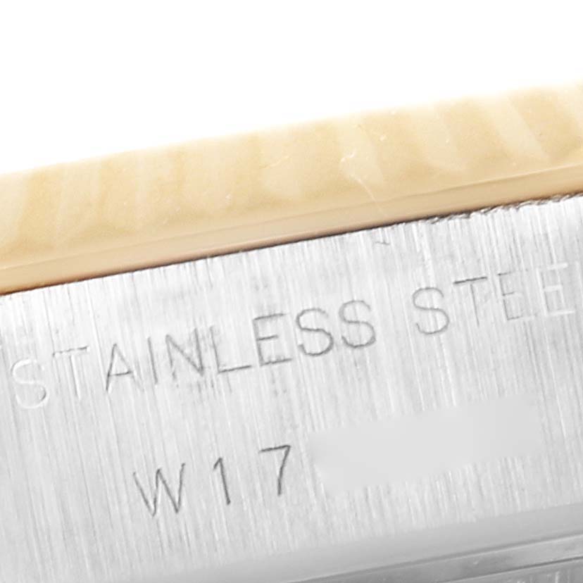 This image shows a close-up of the stainless steel case back engraving of a Rolex Datejust 69173 Women's Steel and Gold (two tone) Black Dial 69173 Women's Steel and Gold (two tone) Black Dial watch.