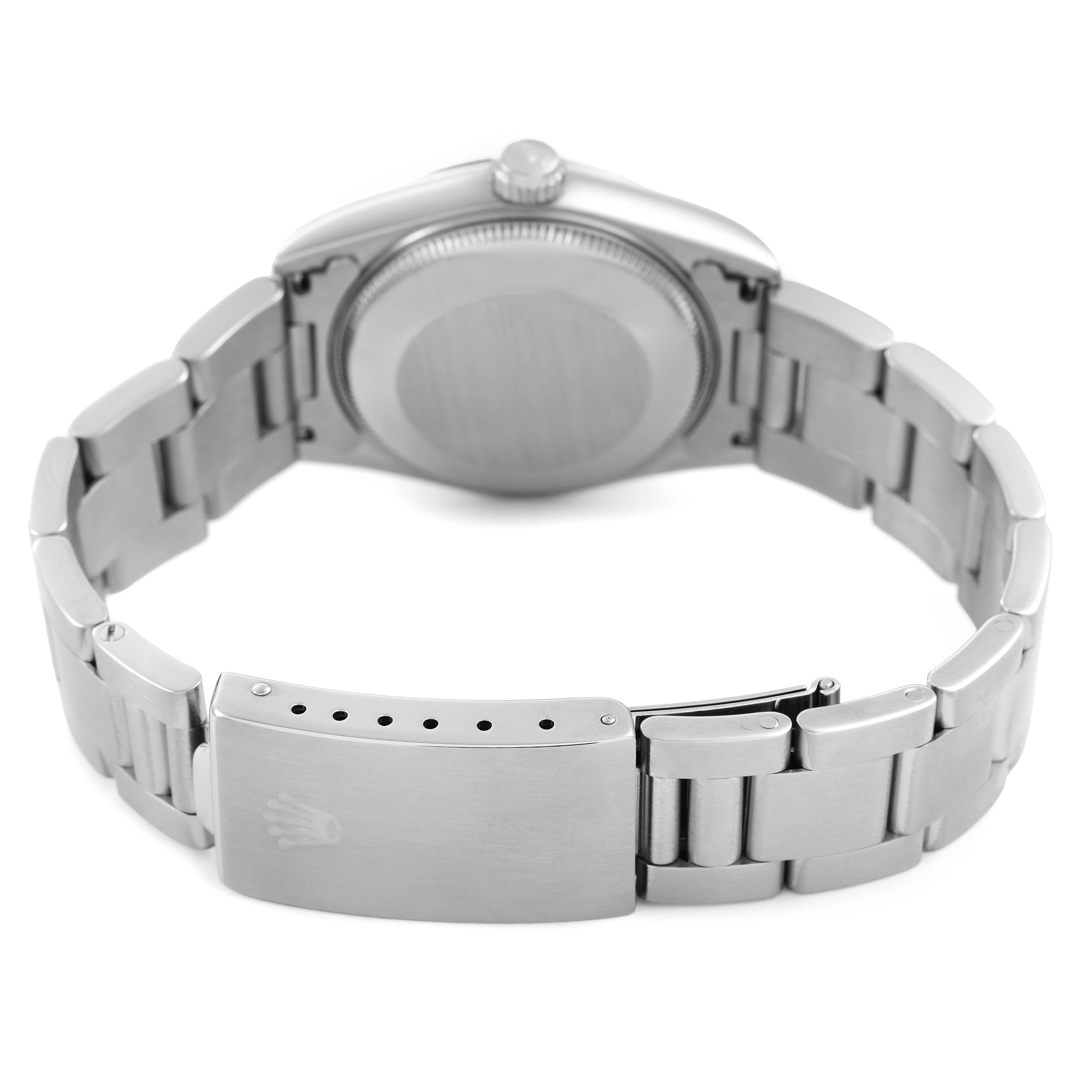 The image shows a Mid-Size Rolex watch from the back, focusing on the case back and metal bracelet with a clasp.