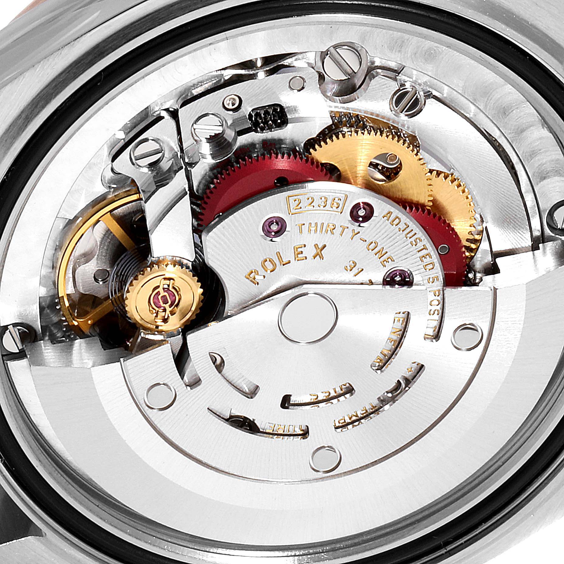 The image shows the internal movement mechanism of a Rolex Mid-Size 278271 Women
s Rose Gold Silver Dial 278271 Women
s Rose Gold Silver Dial model watch at an angled view.