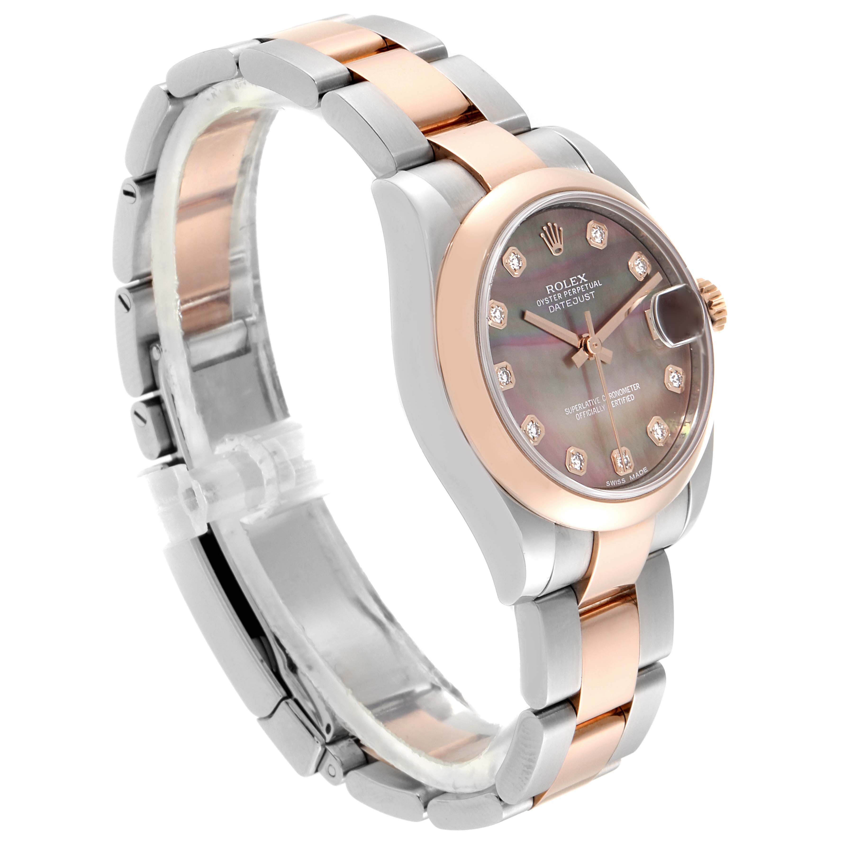 The image shows a side view of a Rolex Datejust Mid-Size watch, highlighting its two-tone metal bracelet and diamond hour markers.