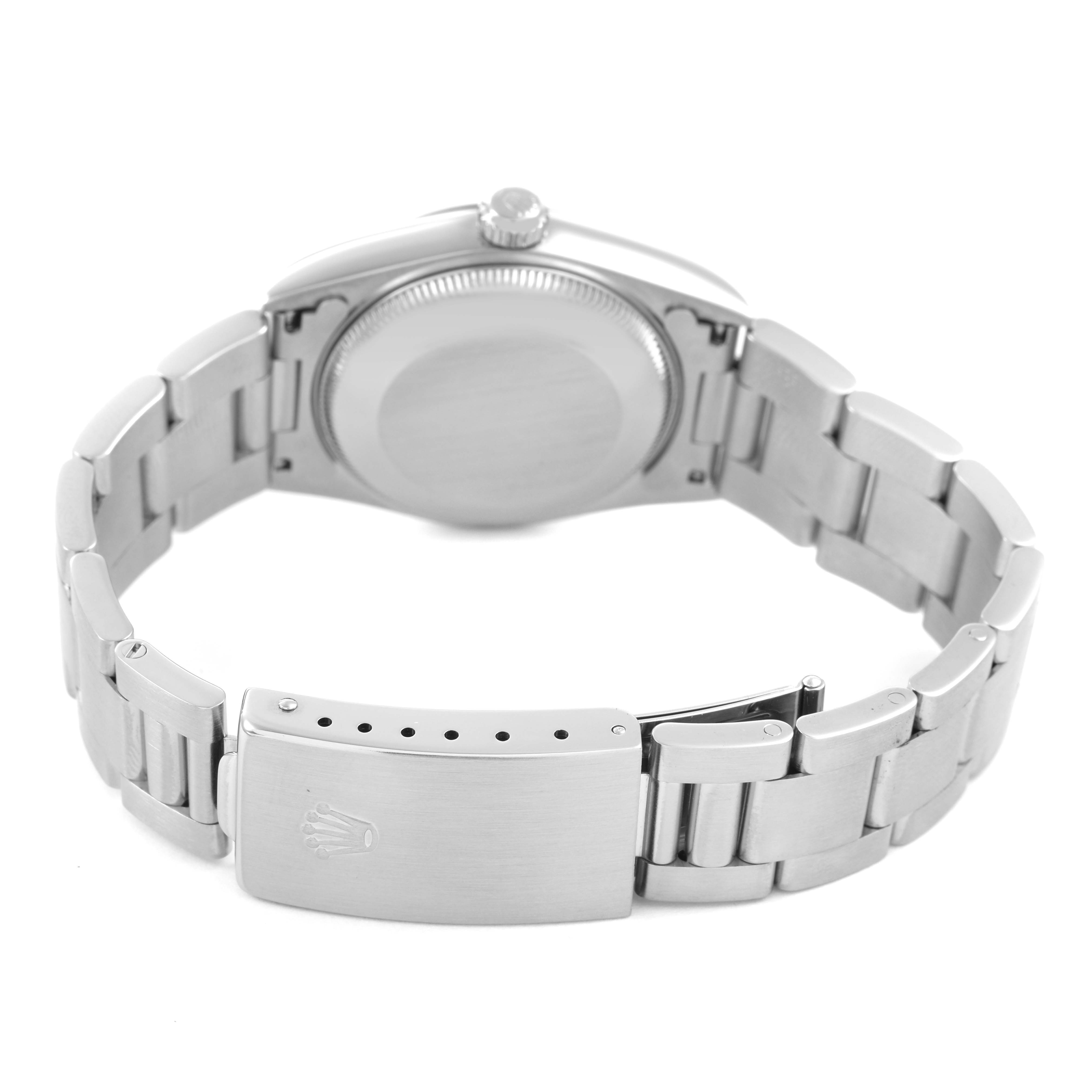 The Rolex Datejust 78240 Women's Stainless Steel Silver Dial watch is shown from the back, highlighting the clasp, crown, and bracelet.