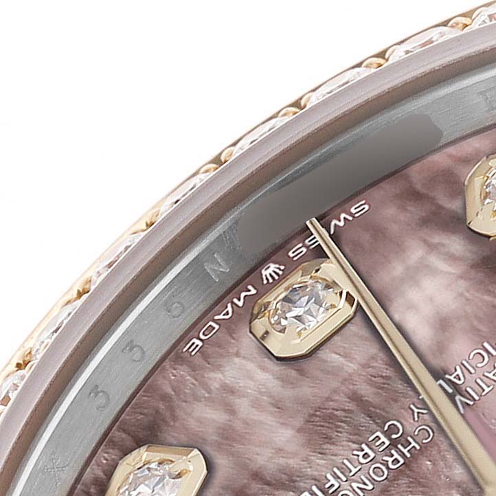 The image shows a close-up of a Rolex Mid-Size 278383 Women's Steel and Gold (two tone) Mother of Pearl Dial model's dial, featuring diamond hour markers and part of the bezel.