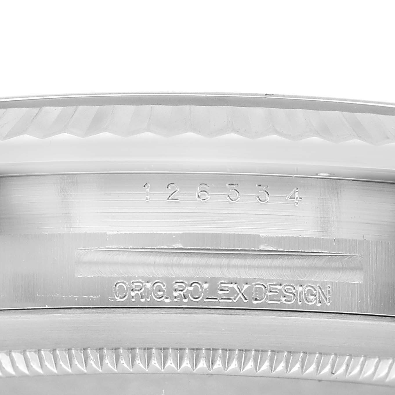 The image shows a close-up of the case side, bezel, and model engraving on a Rolex Datejust 41 126334 Men's Stainless Steel Silver Dial.