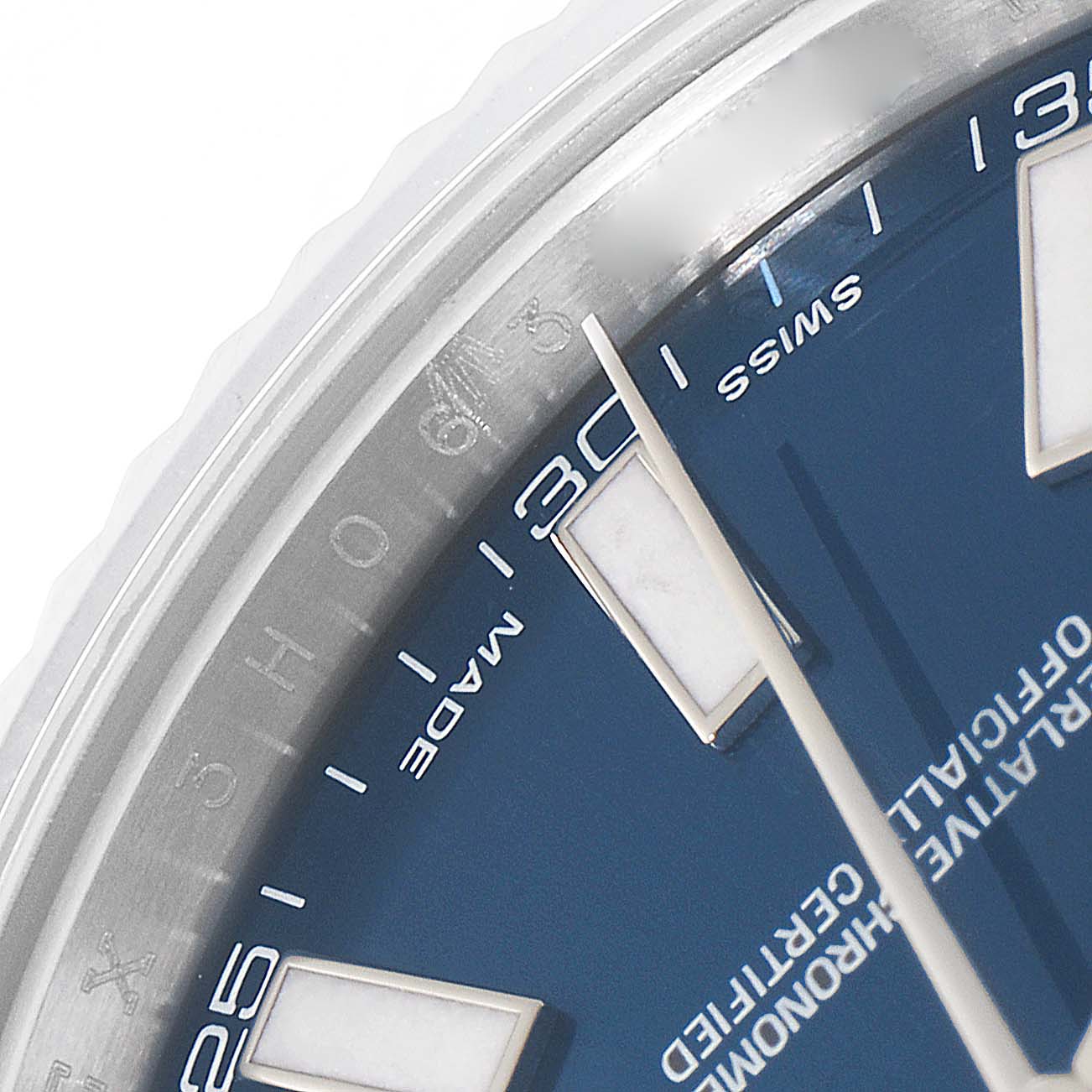 This close-up image shows part of the dial and bezel of a Rolex Datejust 41 116334 Men's Stainless Steel Blue Dial 116334 Men's Stainless Steel Blue Dial watch, focusing on the 30-minute marker.