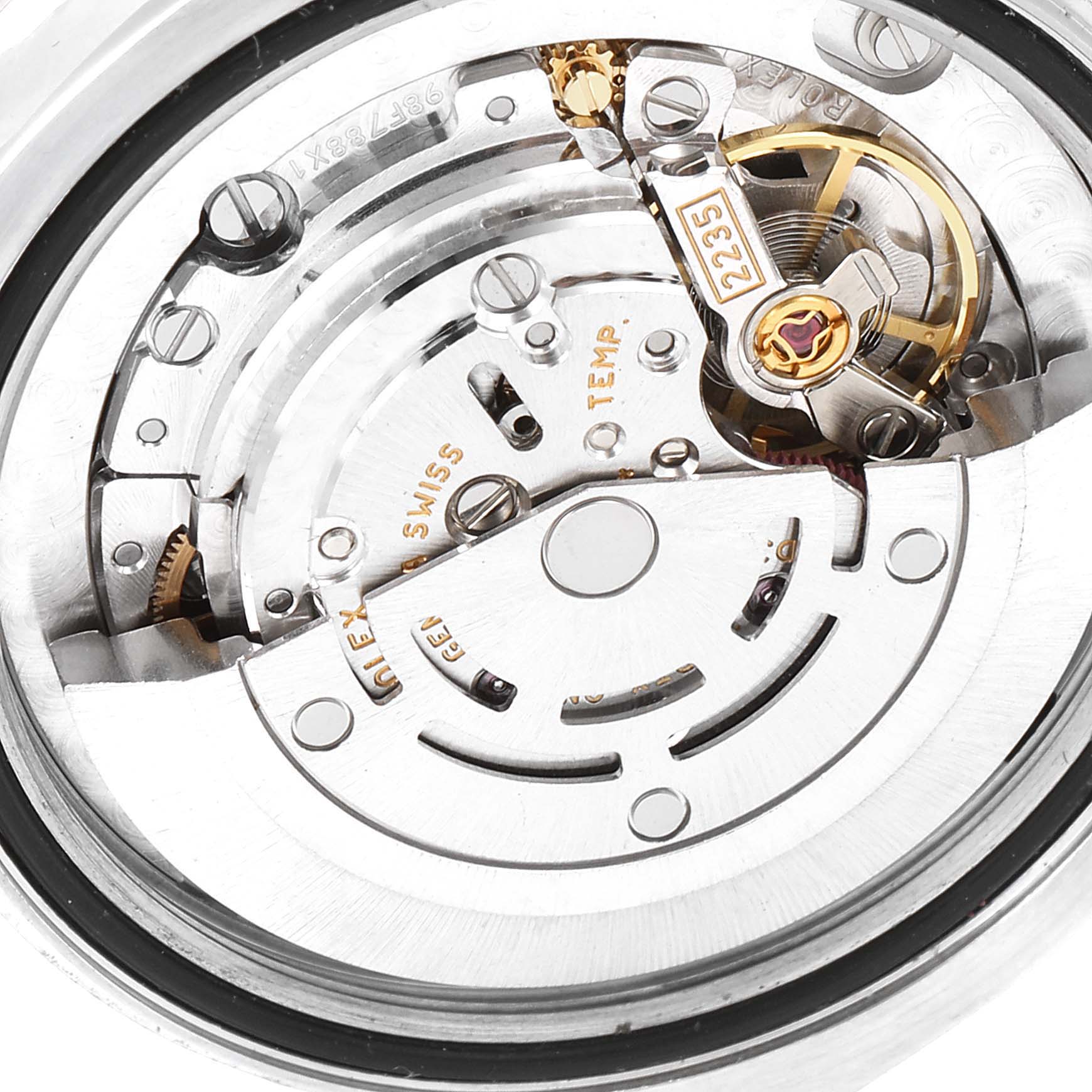 This is a close-up view of the movement mechanism inside a Mid-Size Rolex watch.