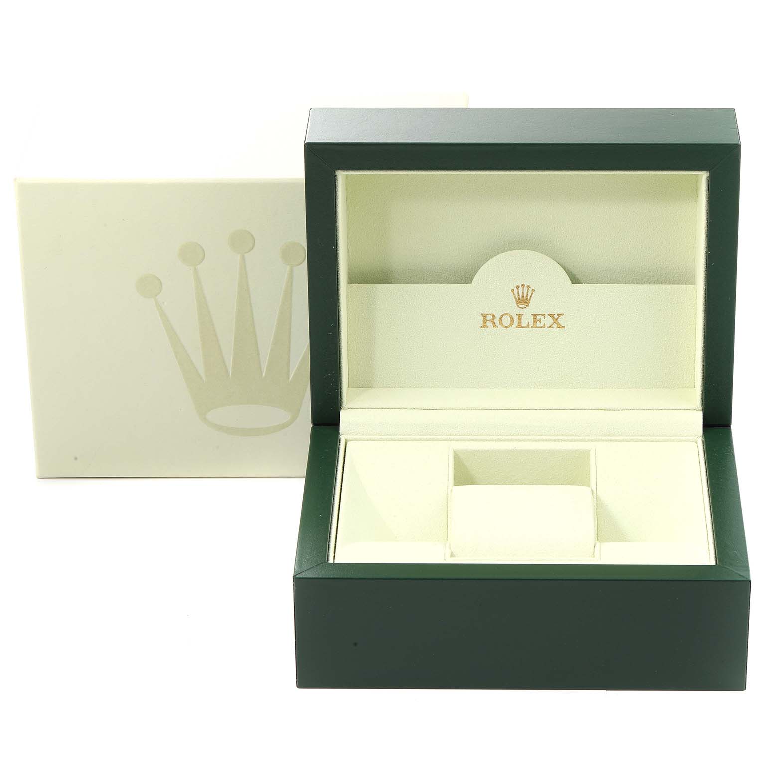 The image shows an open green and beige Rolex box for the Datejust model, with the outer packaging in the background.