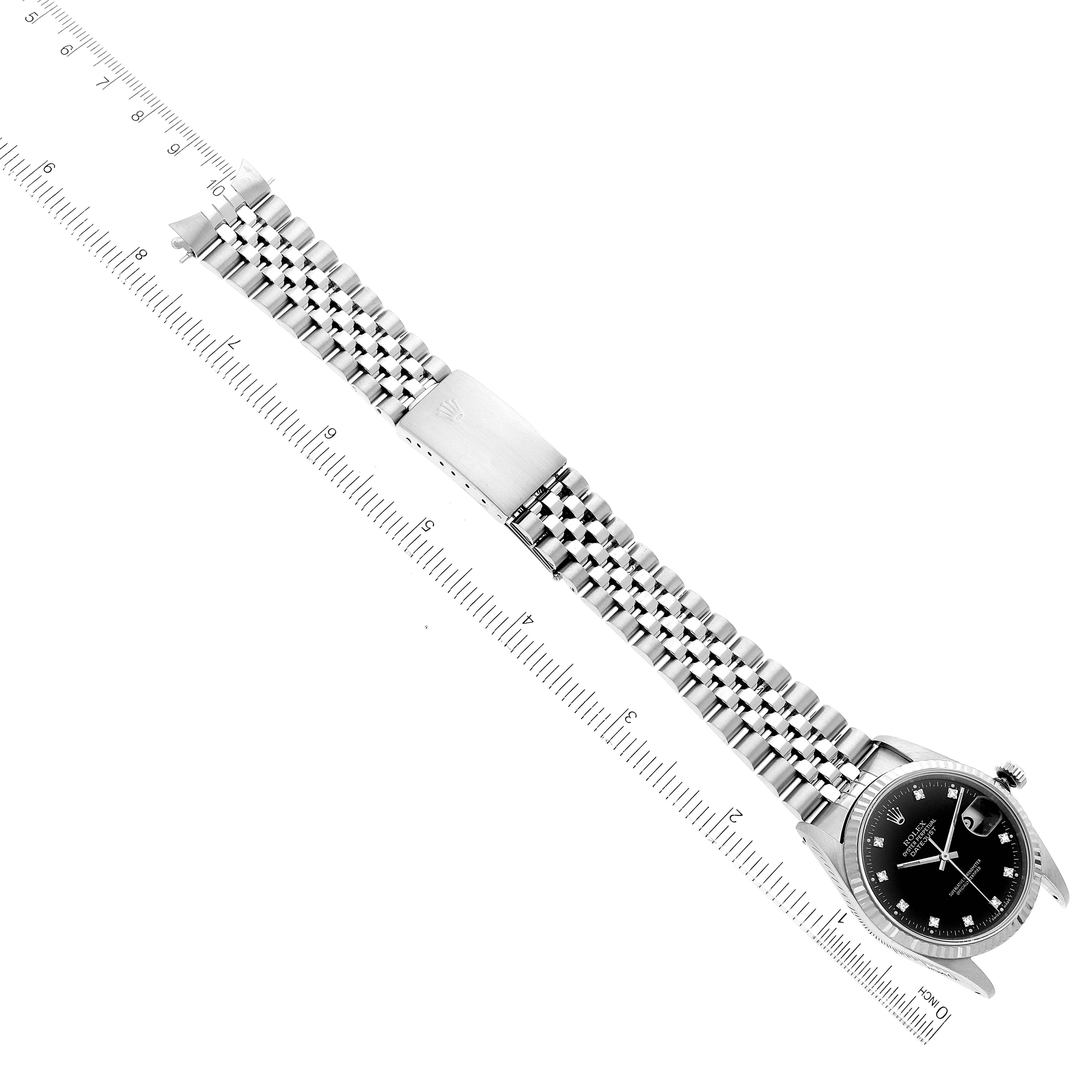 The image shows a Rolex Datejust 16234 Men's Stainless Steel Black Dial 16234 Men's Stainless Steel Black Dial watch placed at a diagonal angle with its full bracelet and clasp visible.