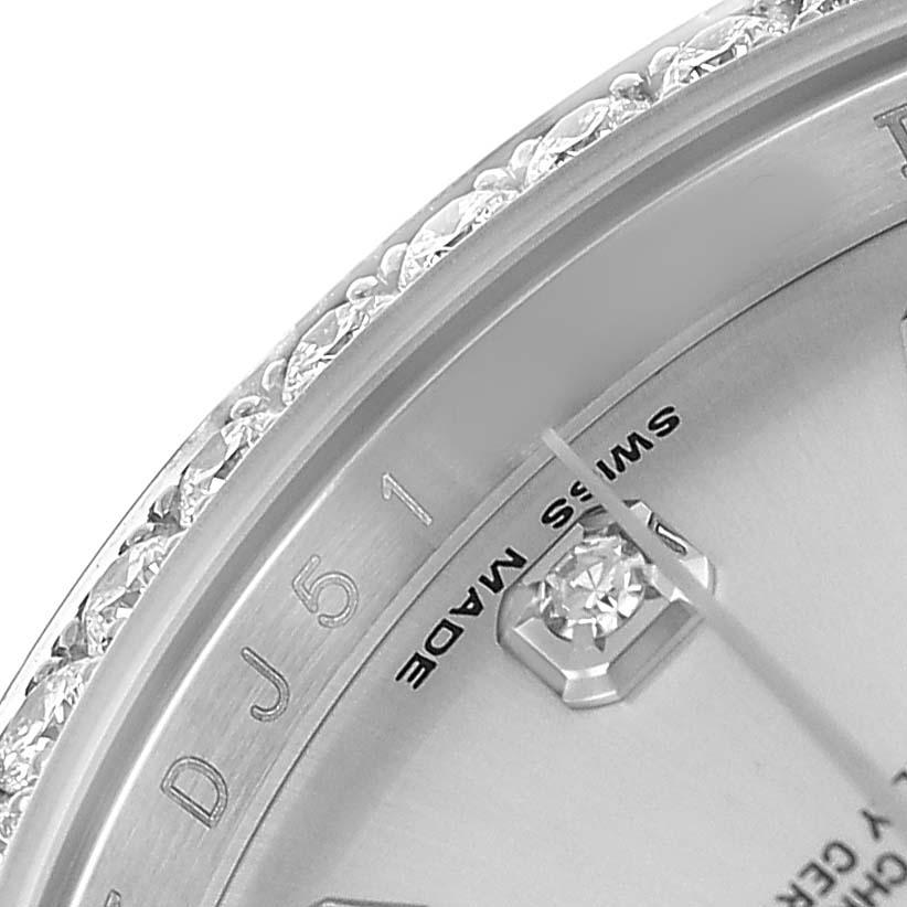 The image shows a detailed close-up of the Rolex Datejust 116244 Men's Stainless Steel Silver Dial watch's bezel, part of the dial, and the gem-set markers.