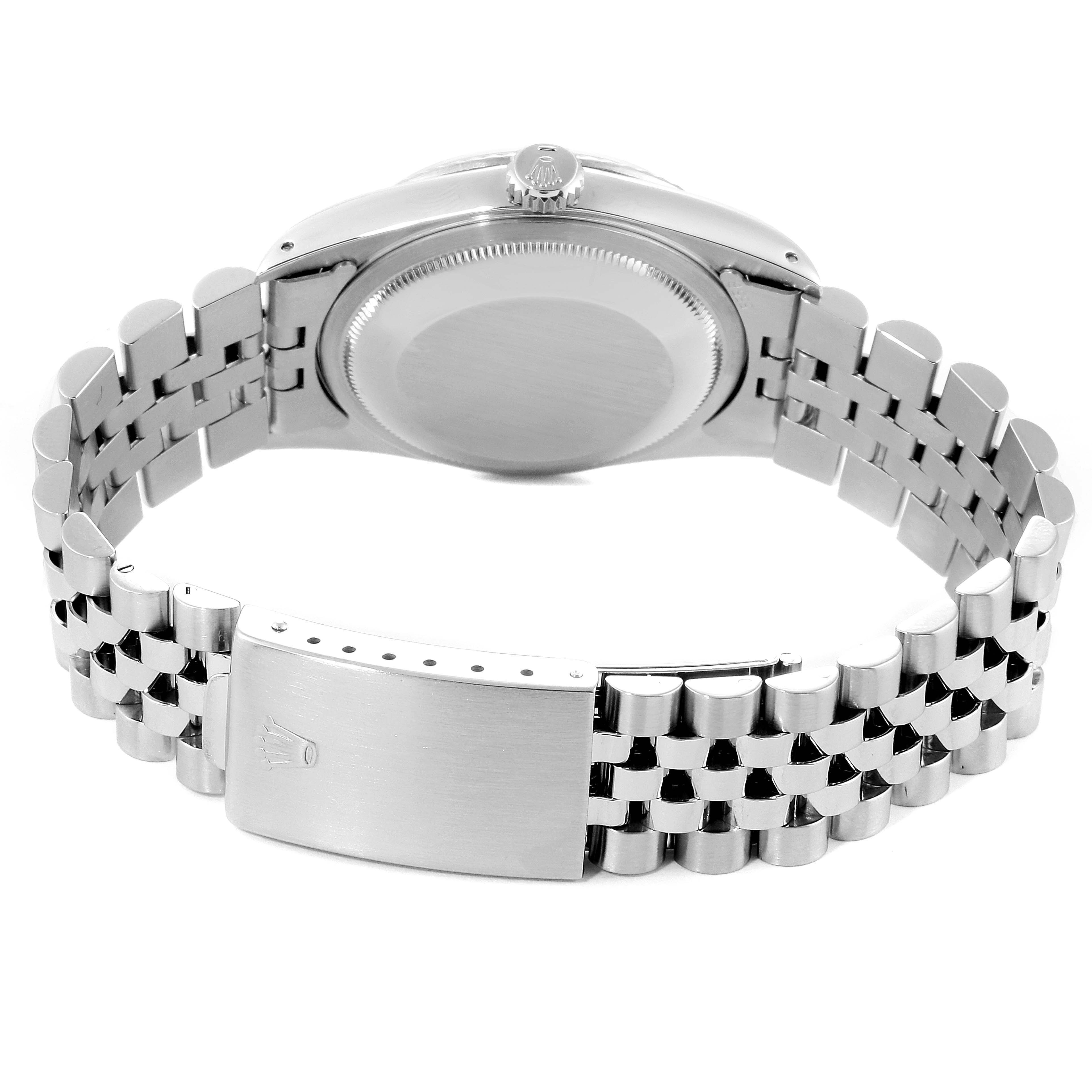 The image shows the back view of a Rolex Datejust 16234 Men's Stainless Steel Silver Dial 16234 Men's Stainless Steel Silver Dial watch, highlighting its case back and metal bracelet with the clasp.