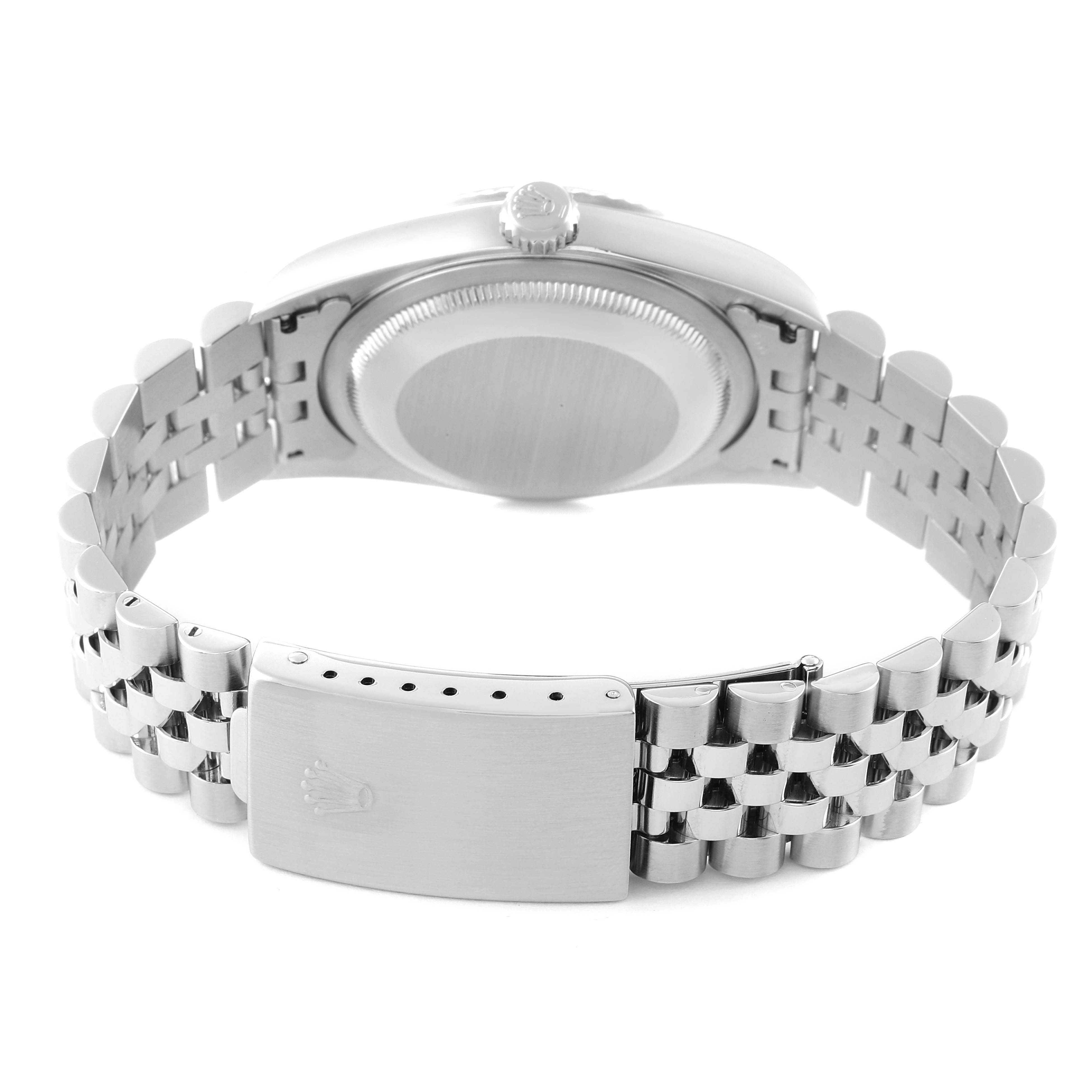 The image shows the back view of a Rolex Datejust 16234 Men's Stainless Steel Silver Dial 16234 Men's Stainless Steel Silver Dial watch, focusing on the case back and the clasp of the bracelet.