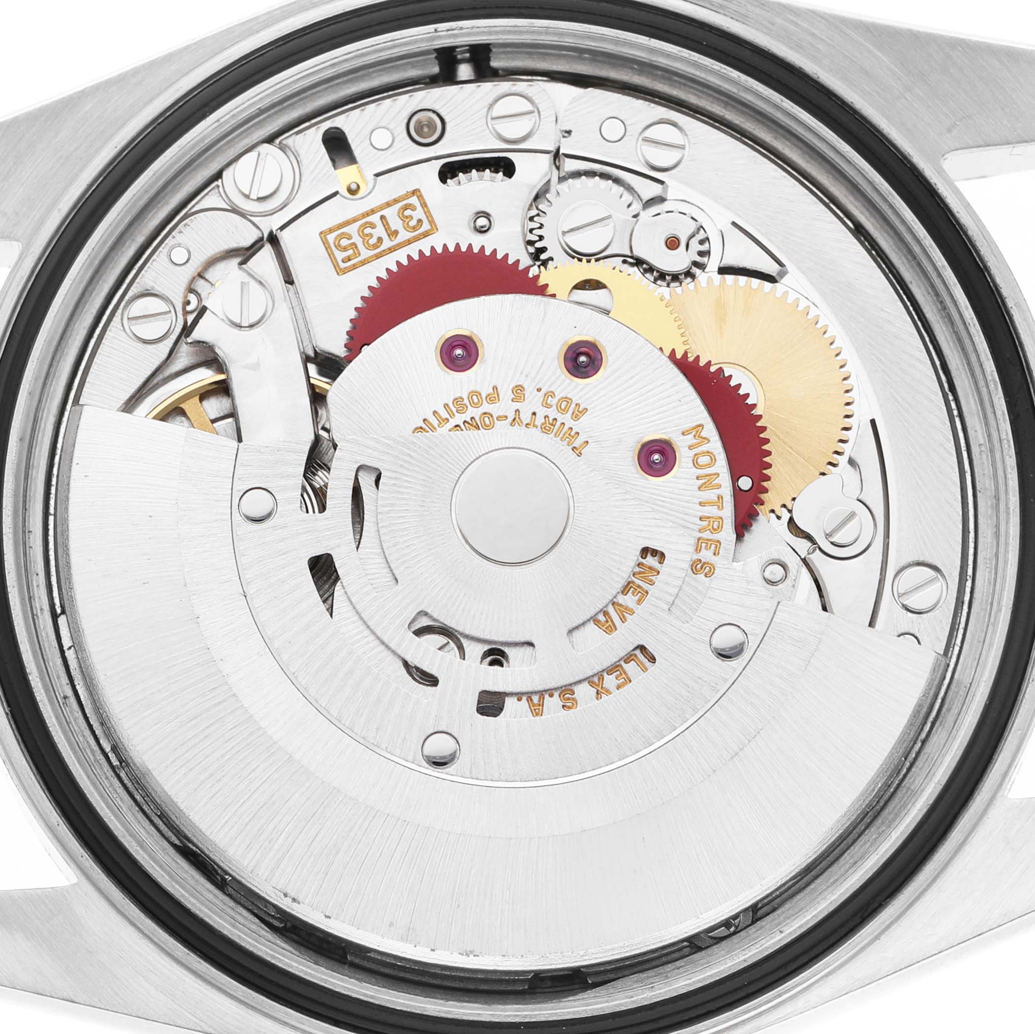 The image shows the movement of a Rolex Datejust 16233 Women's Steel and Gold (two tone) Silver Dial watch from a top-down angle, exposing gears and the rotor.
