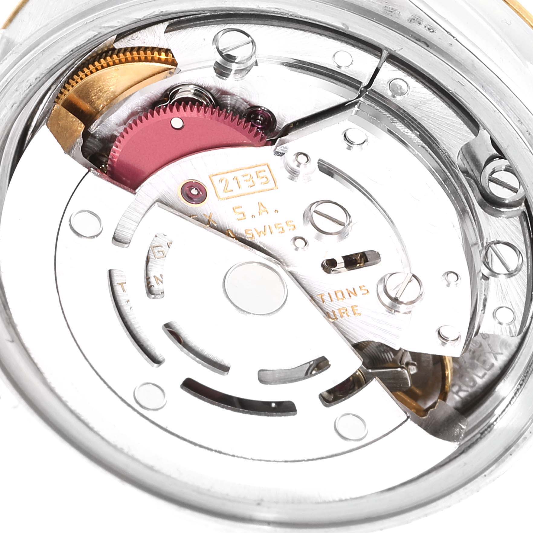 The image shows a close-up of the internal mechanism of a Rolex Datejust 69173 Women's Steel and Gold (two tone) White Dial 69173 Women's Steel and Gold (two tone) White Dial watch, focusing on its movement components.