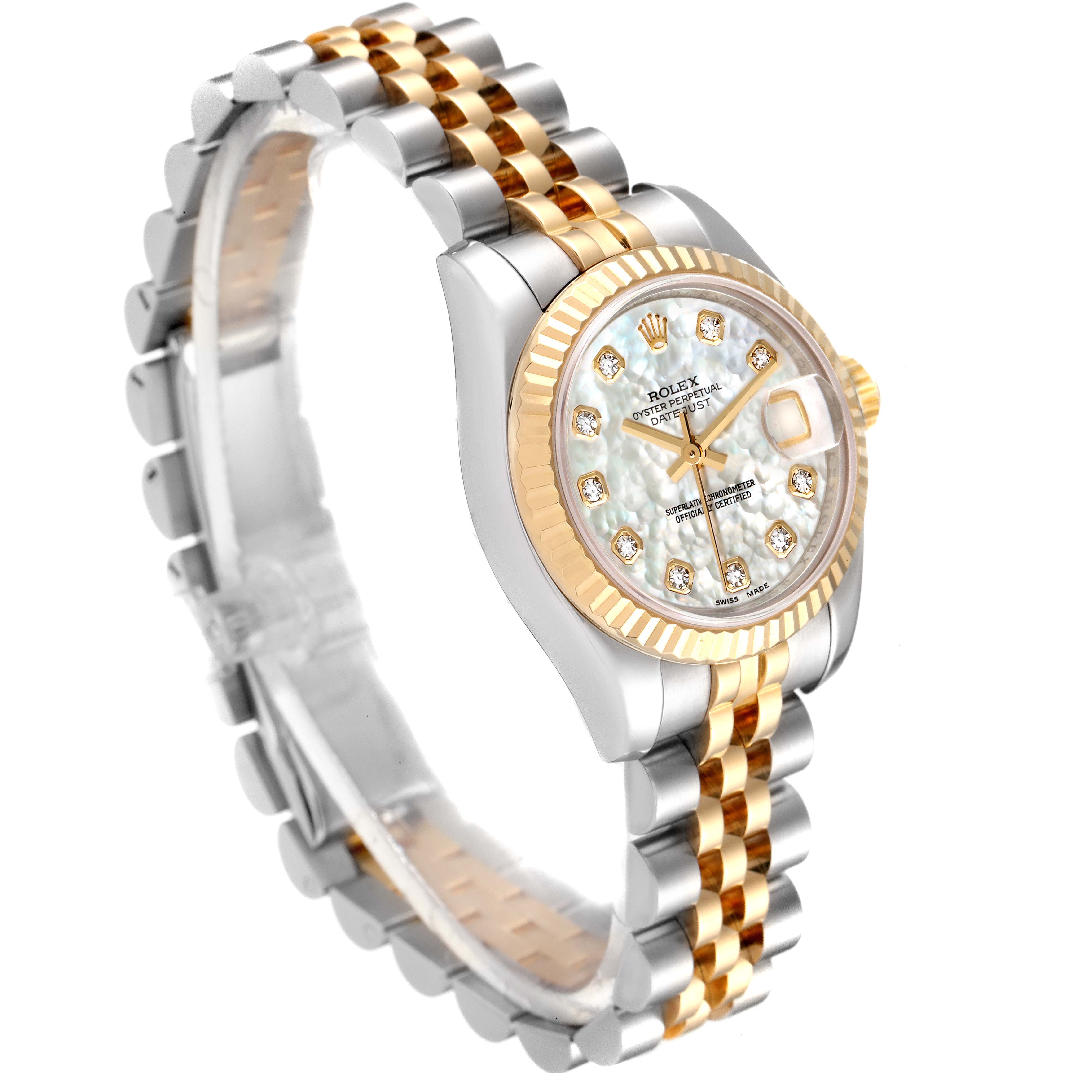 The image shows a Rolex Datejust 179173 Women's Steel and Gold (two tone) Mother of Pearl Dial 179173 Women's Steel and Gold (two tone) Mother of Pearl Dial watch at an angled side view, displaying its two-tone bracelet, bezel, and dial with diamond hour markers.