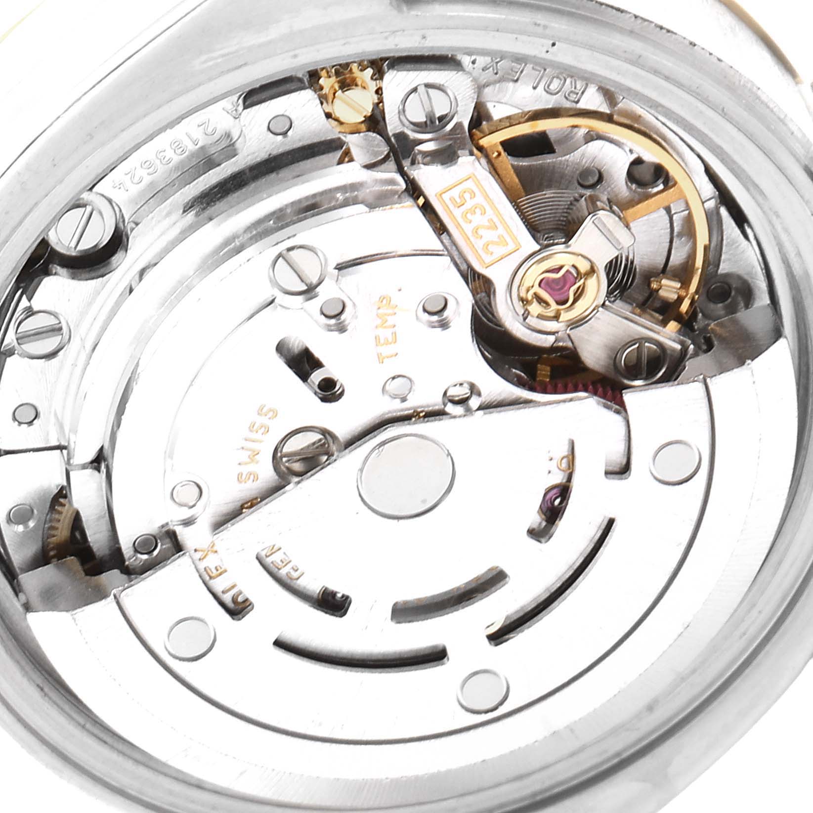 The image shows a close-up view of the movement mechanism inside a Rolex Datejust 179173 Women's Steel and Gold (two tone) Mother of Pearl Dial 179173 Women's Steel and Gold (two tone) Mother of Pearl Dial watch.