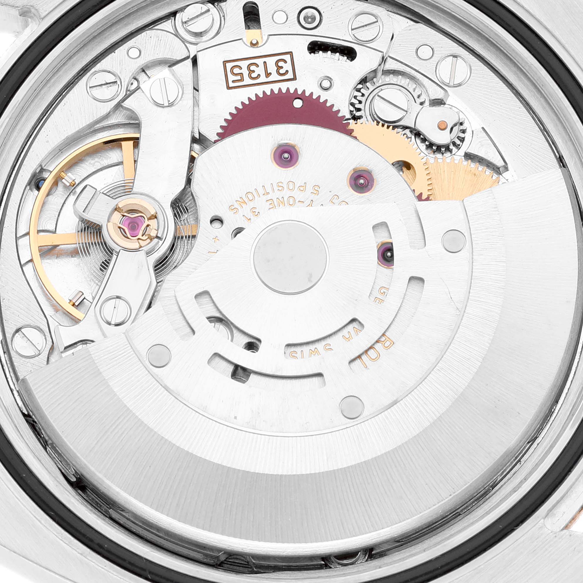 This image shows the internal mechanical movement of a Rolex Datejust 116233 Men's Steel and Gold (two tone) Silver Dial 116233 Men's Steel and Gold (two tone) Silver Dial watch, viewed from the back.