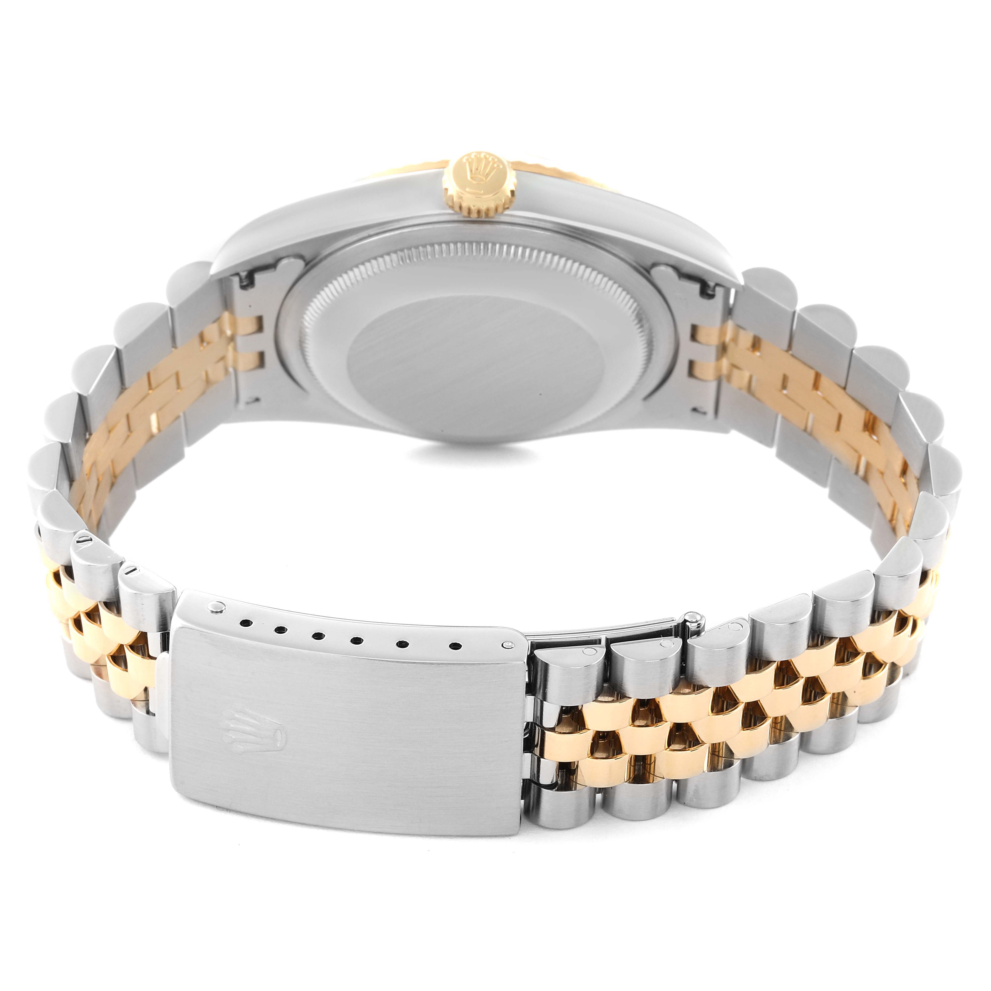 This image shows the back view of a Rolex Datejust 16233 Men
s Steel and Gold (two tone) Grey Dial 16233 Men
s Steel and Gold (two tone) Grey Dial watch, featuring its caseback and two-tone bracelet with the clasp.