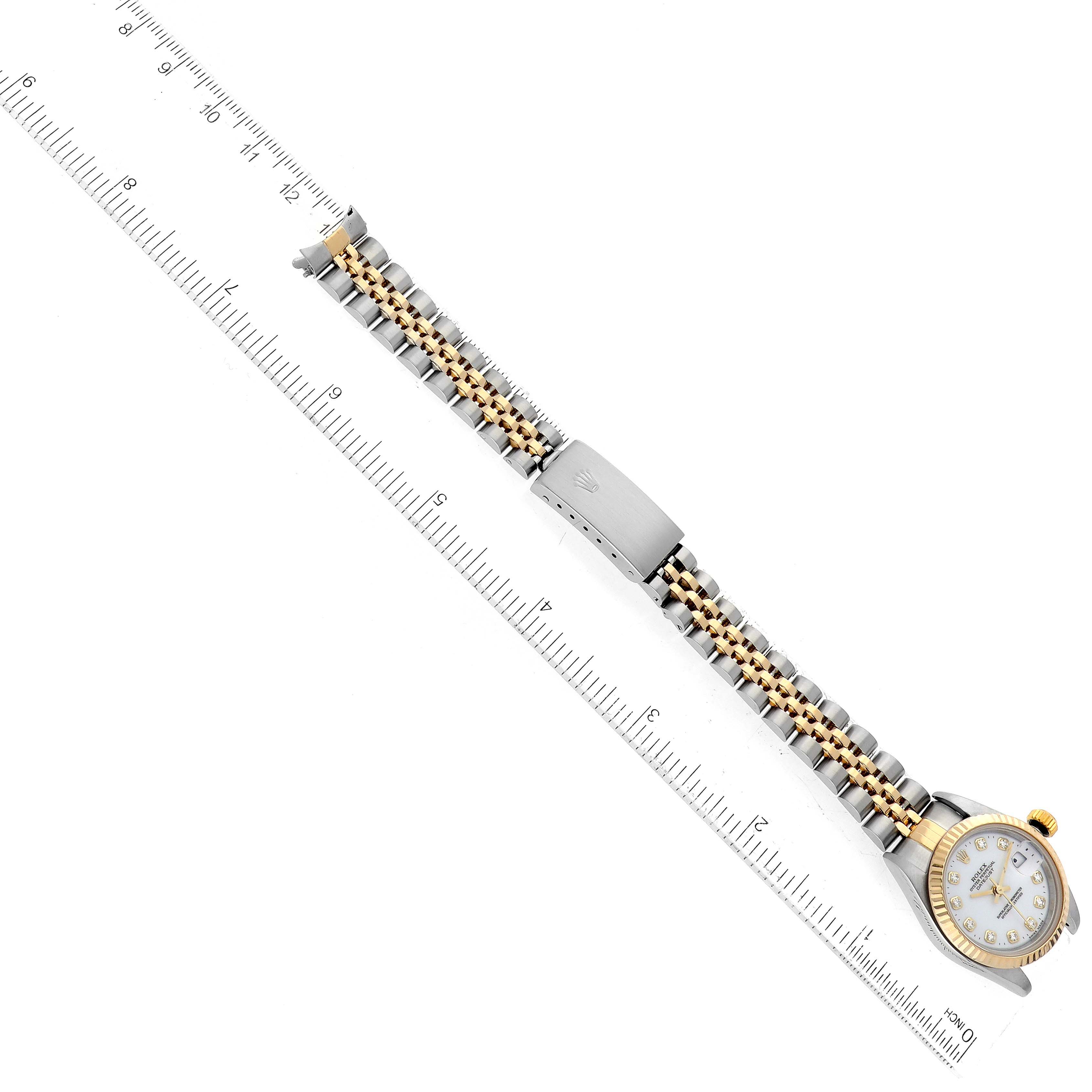 The image shows the side angle of a Rolex Datejust 79173 Women's Steel and Gold (two tone) White Dial 79173 Women's Steel and Gold (two tone) White Dial watch, focusing on the bracelet with a ruler for measurement.