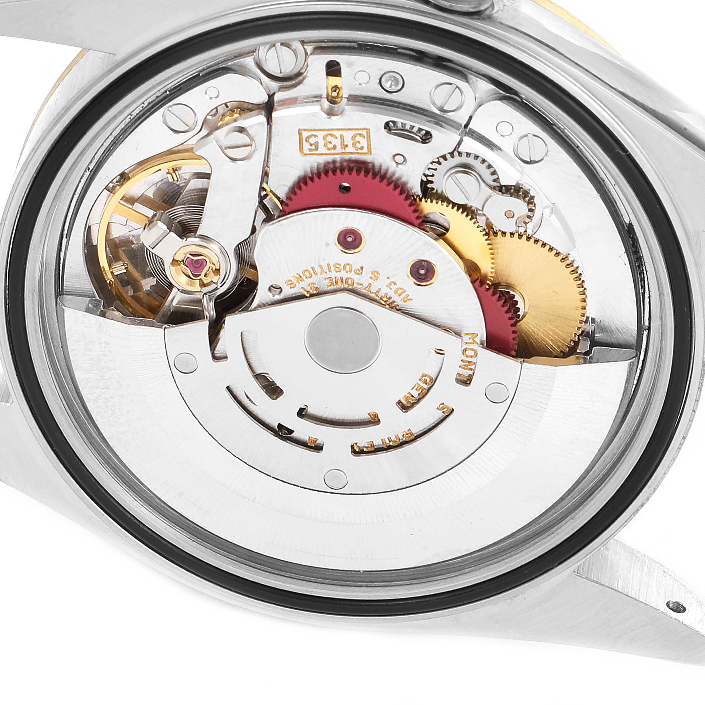 This image shows the movement components of a Rolex Datejust 16233 Men's Steel and Gold (two tone) White Dial 16233 Men's Steel and Gold (two tone) White Dial watch viewed from the back.