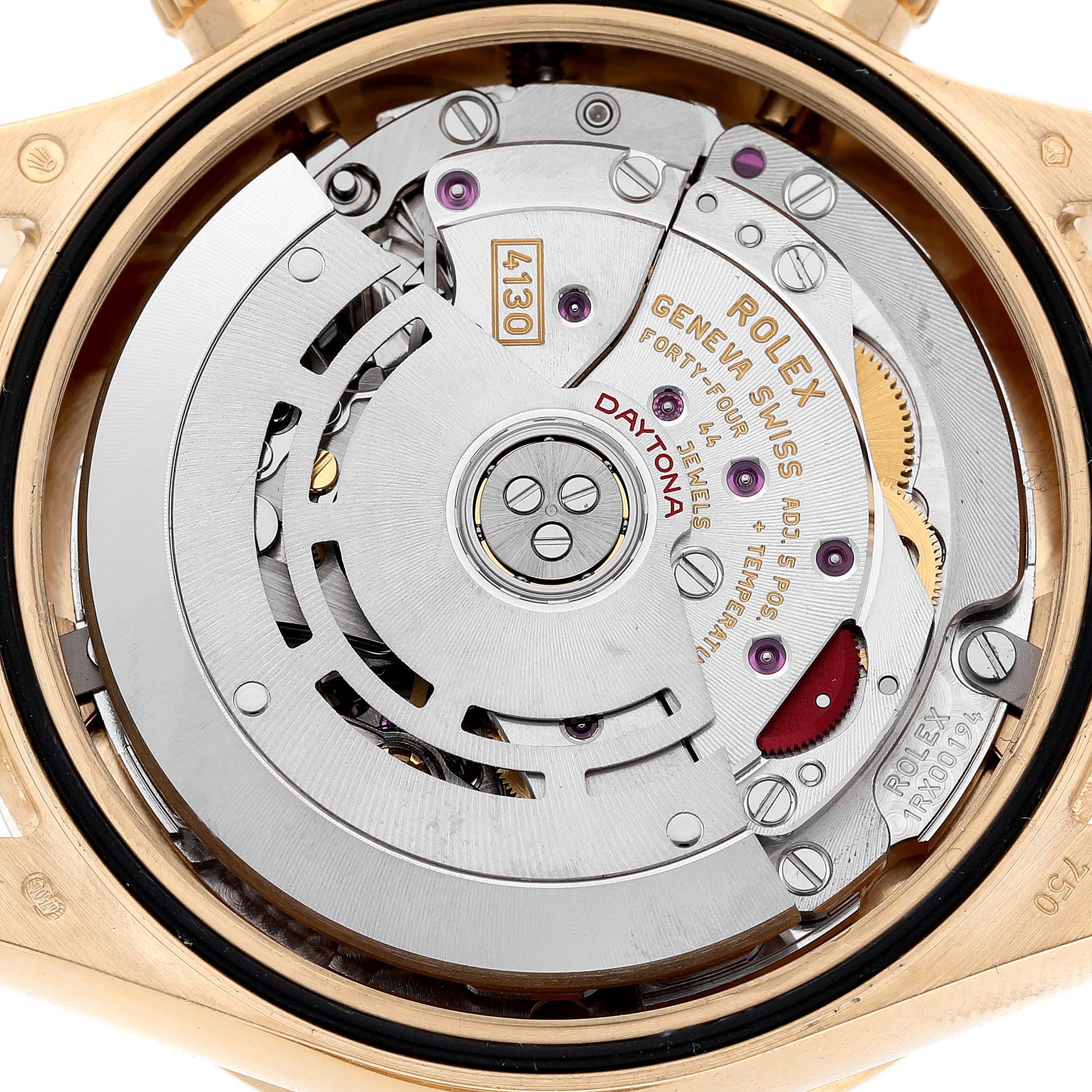 The image shows the movement of a Rolex Daytona 116508 Men's Yellow Gold Green Dial watch from a top-down angle, highlighting the intricate internal components.