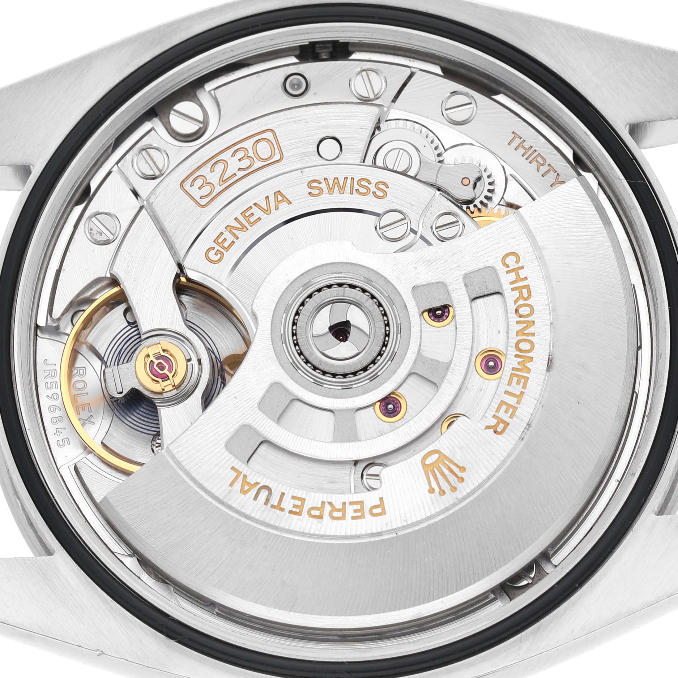 The image shows the back view of a Rolex Explorer 124270 Men's Stainless Steel Black Dial watch, highlighting its movement and rotor.