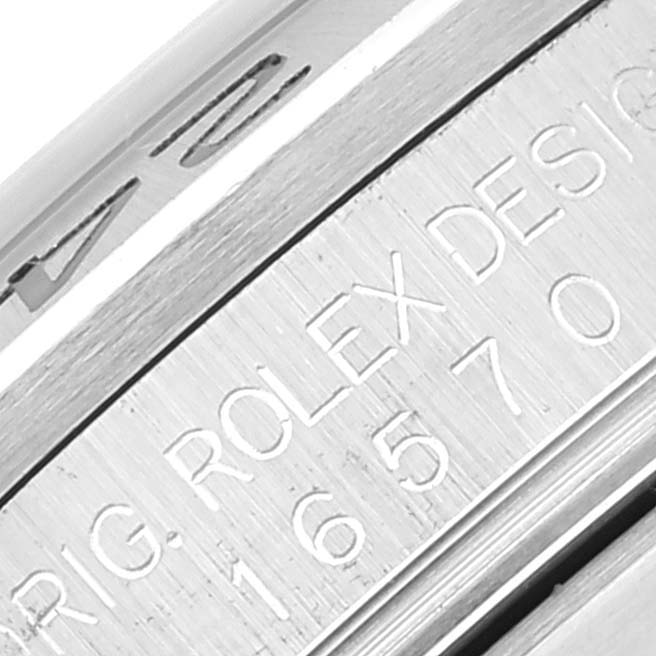 Close-up view of the engraved case side of a Rolex Explorer 16570 Men's Stainless Steel White Dial 16570 Men's Stainless Steel White Dial watch, highlighting the serial and reference numbers.
