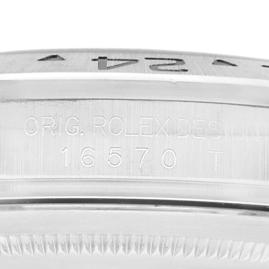 This image shows a close-up of the side engraving on a Rolex Explorer 16570 Men's Stainless Steel White Dial 16570 Men's Stainless Steel White Dial model, featuring the design and model number.