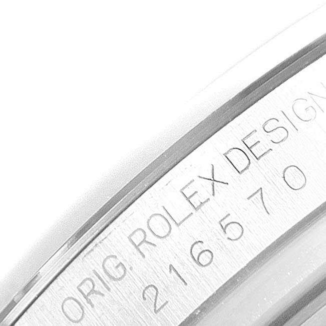 The image shows the side engraving on the case of a Rolex Explorer 216570 Men
s Stainless Steel White Dial 216570 Men
s Stainless Steel White Dial model watch.