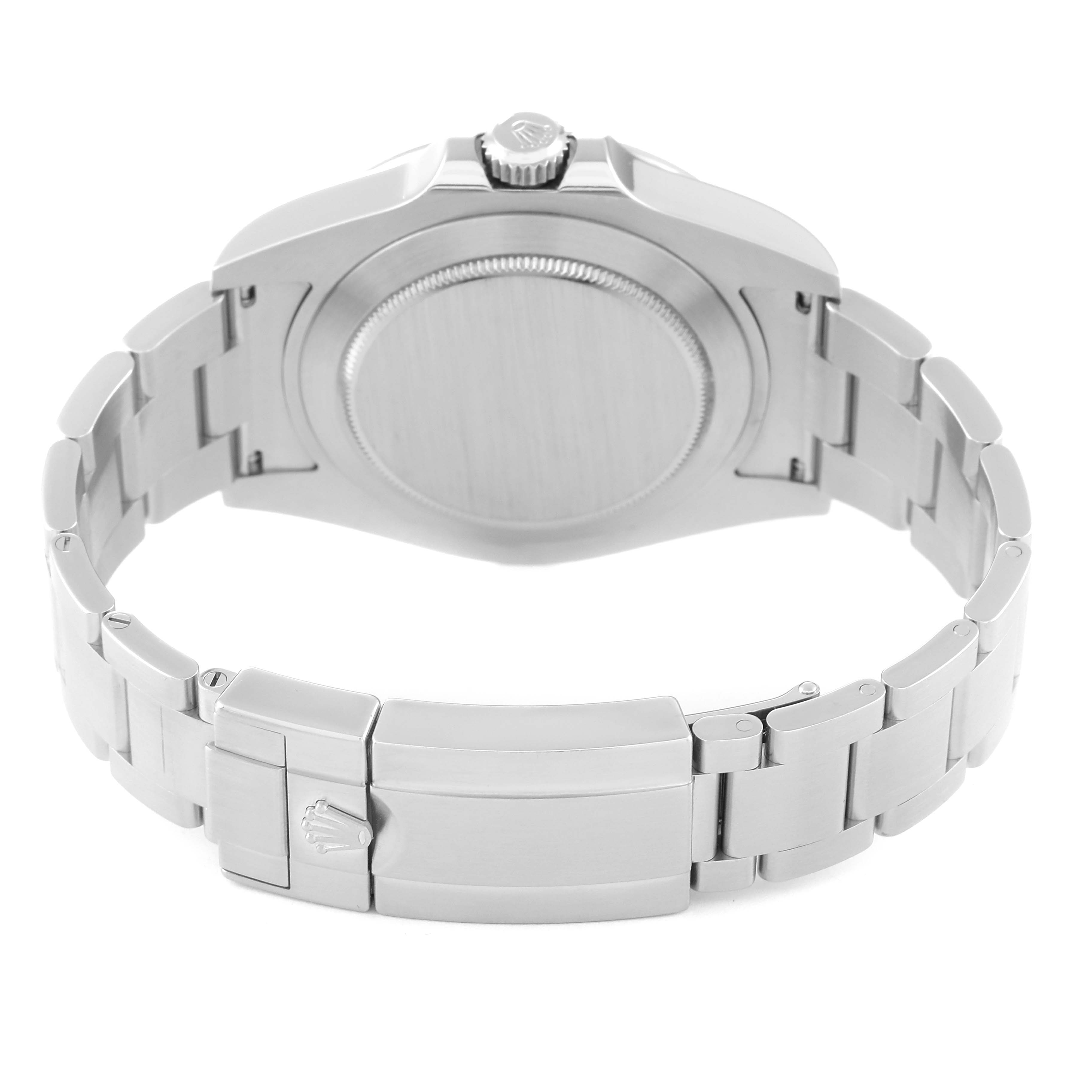 The image shows the back view of a Rolex Explorer 216570 Men
s Stainless Steel White Dial 216570 Men
s Stainless Steel White Dial watch, highlighting its caseback and metal bracelet with clasp.