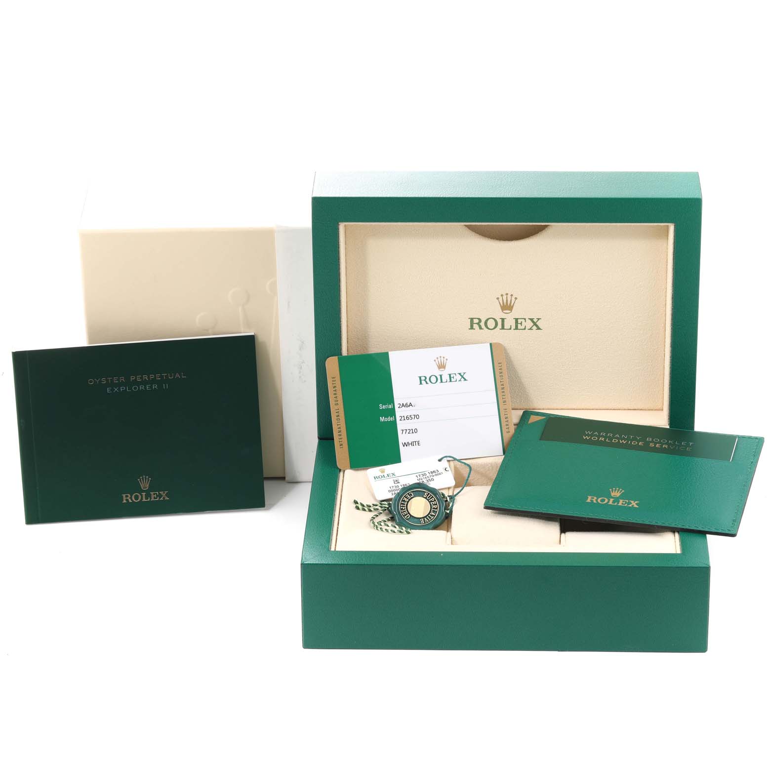 The image shows the packaging and accessories, including booklets, a tag, and a warranty card, for a Rolex Explorer 216570 Men
s Stainless Steel White Dial 216570 Men
s Stainless Steel White Dial watch.