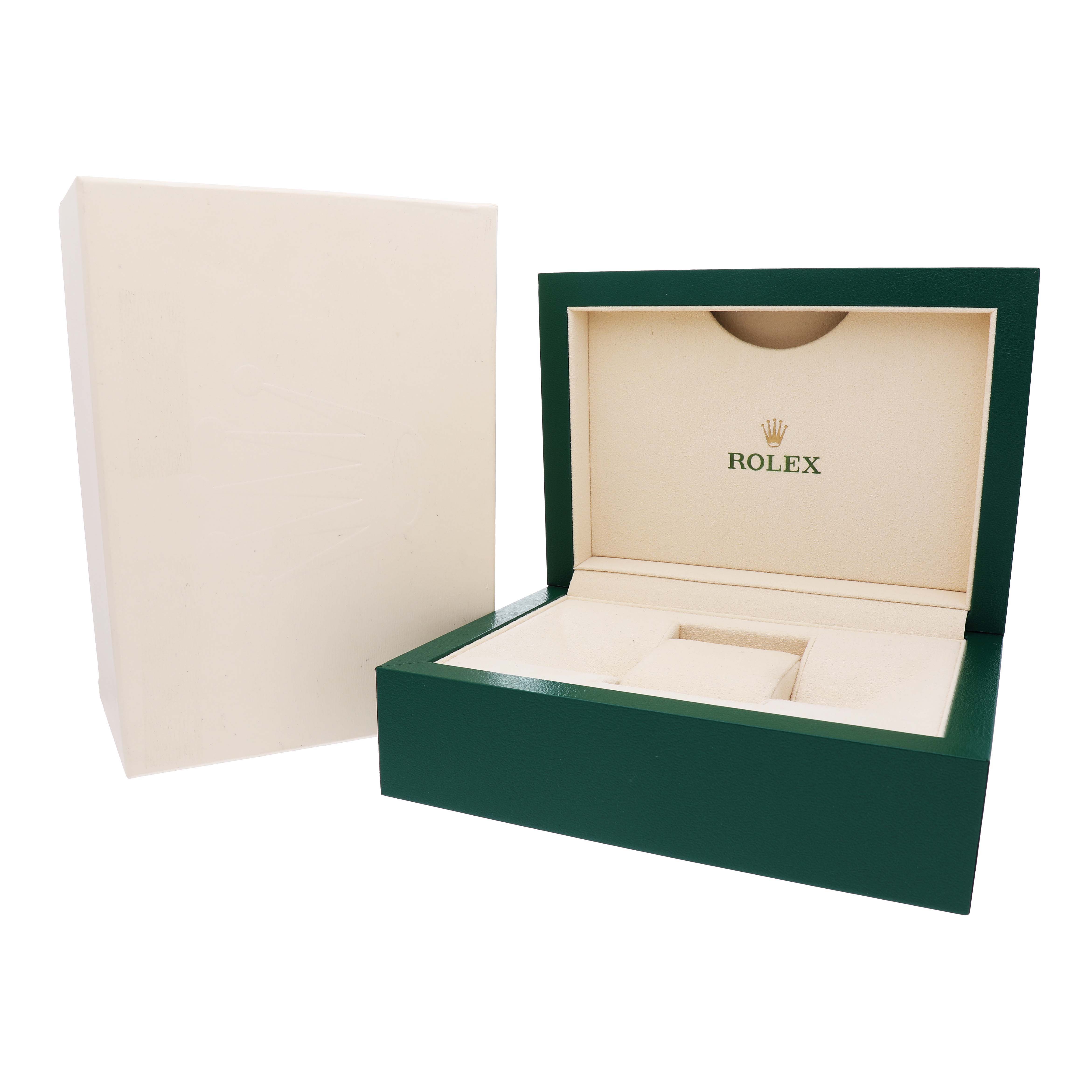 The image shows a Rolex GMT-Master 126720VTNR Men's Stainless Steel Black Dial watch box from a front angle, featuring its green exterior and beige interior with the Rolex logo.