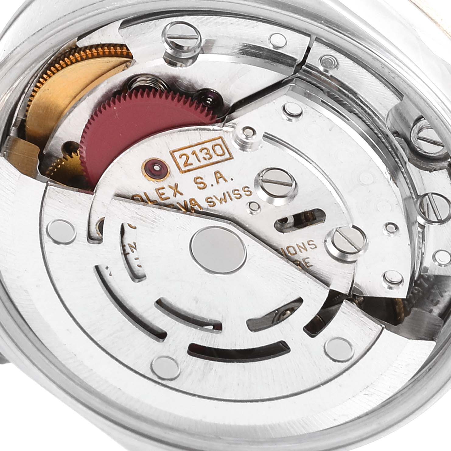 This image shows a close-up of the movement mechanism inside a Rolex Oyster Perpetual 67194 Women's Stainless Steel Silver Dial 67194 Women's Stainless Steel Silver Dial watch.