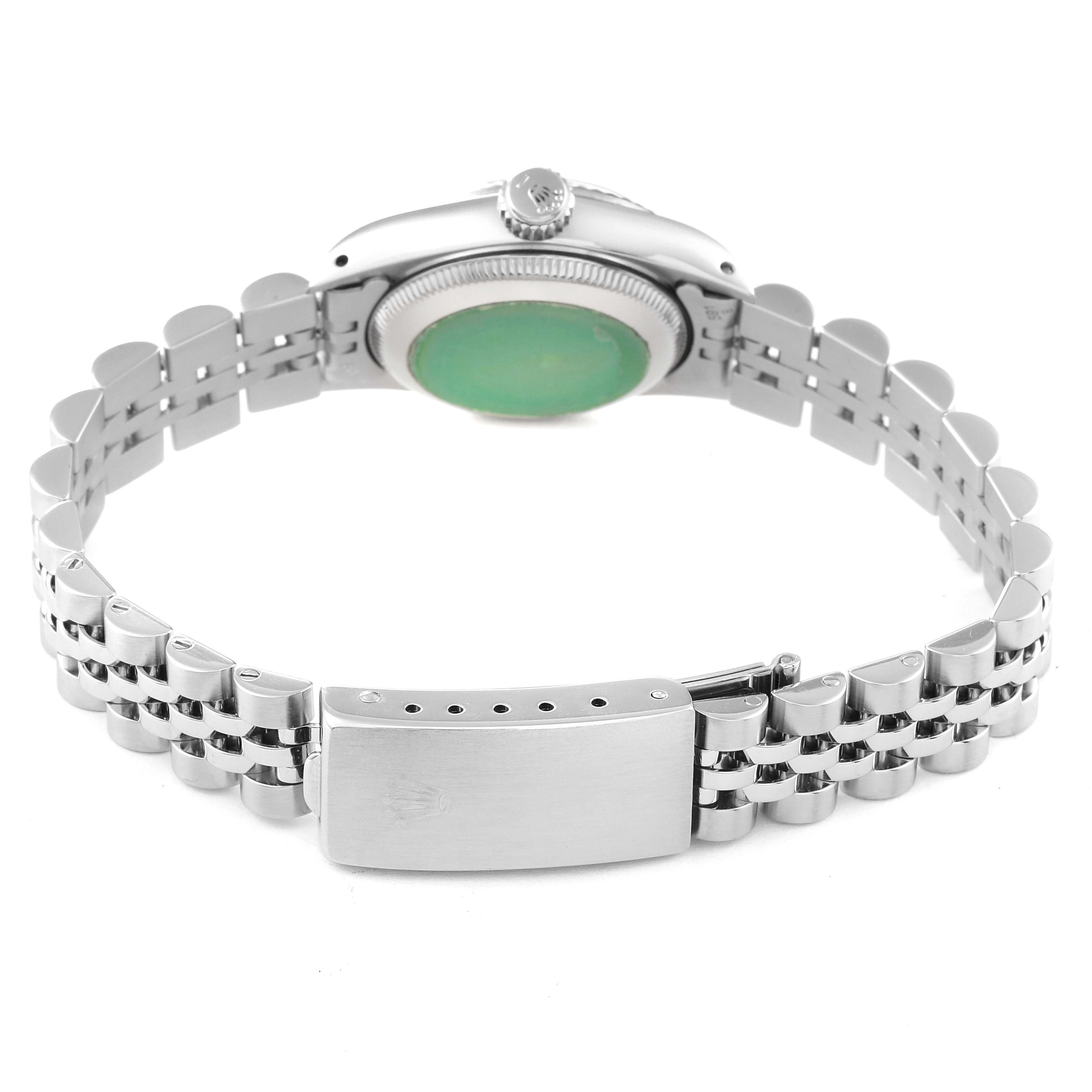 The image shows the back view of a Rolex Oyster Perpetual 67194 Women's Stainless Steel Silver Dial 67194 Women's Stainless Steel Silver Dial watch, highlighting the bracelet and clasp.