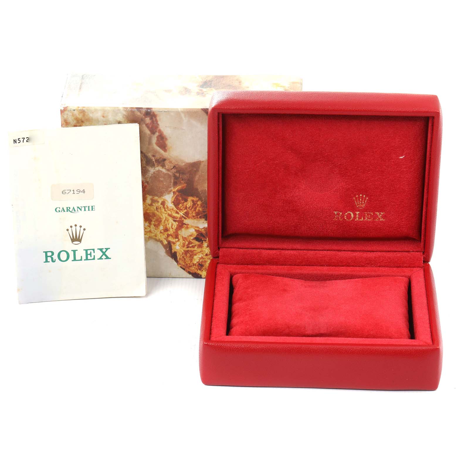 This image shows a red Rolex Oyster Perpetual 67194 Women's Stainless Steel Silver Dial 67194 Women's Stainless Steel Silver Dial watch box, warranty card, and outer box from a front angle.