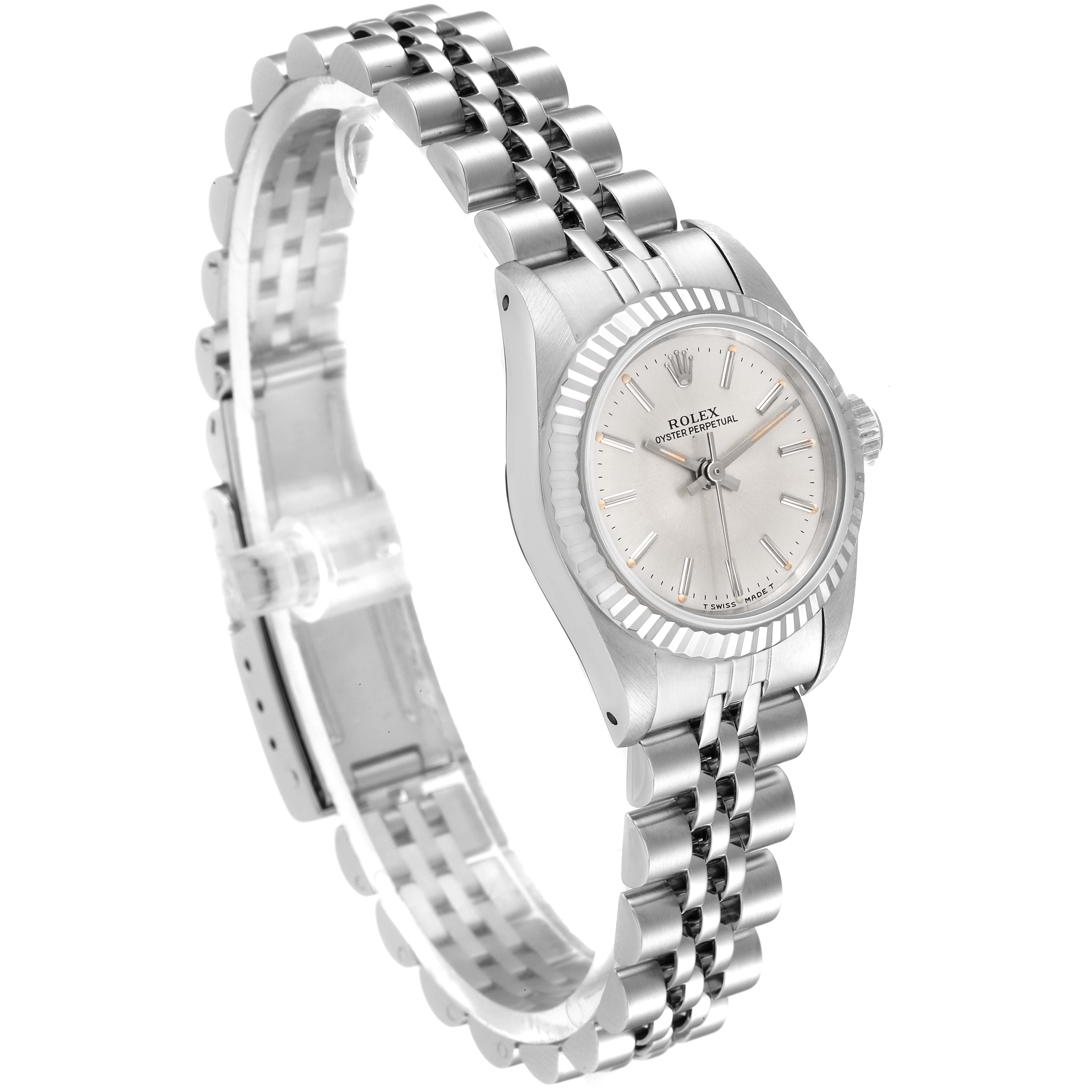 The image shows a side angle of a Rolex Oyster Perpetual 67194 Women's Stainless Steel Silver Dial 67194 Women's Stainless Steel Silver Dial watch, highlighting its dial, bezel, and bracelet.