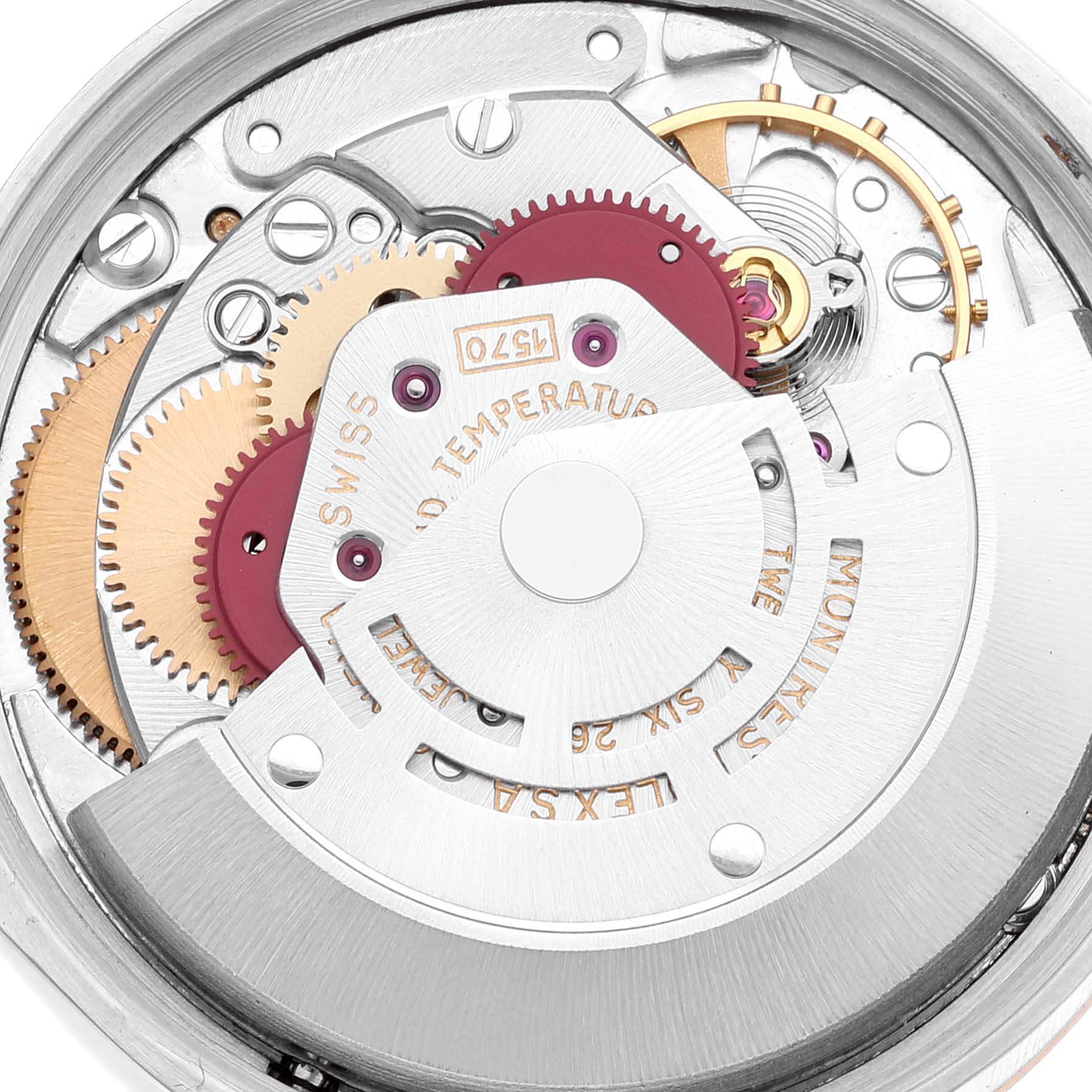 The image shows an internal view of the movement mechanism of a Rolex Oyster Perpetual 1005 Men's Steel and Gold (two tone) Champagne Dial 1005 Men's Steel and Gold (two tone) Champagne Dial watch.