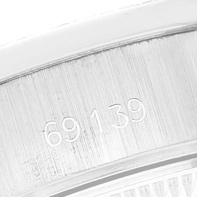 This close-up image shows the engraved model number inside the case of a Rolex President 69139 Women's White Gold Silver Dial 69139 Women's White Gold Silver Dial watch.