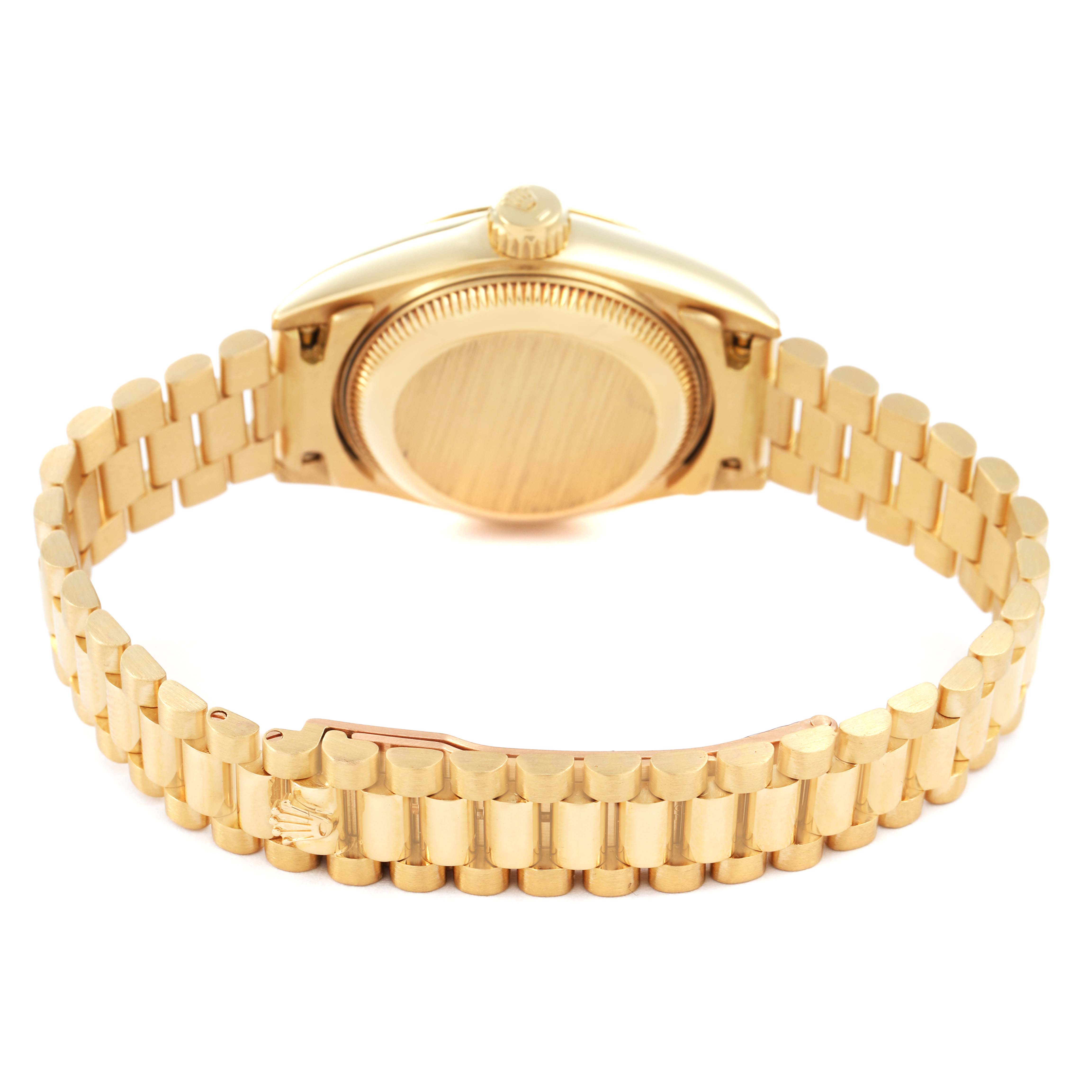 The Rolex President 69178 Women's Yellow Gold Champagne Dial watch is shown from the back, highlighting the bracelet and caseback.