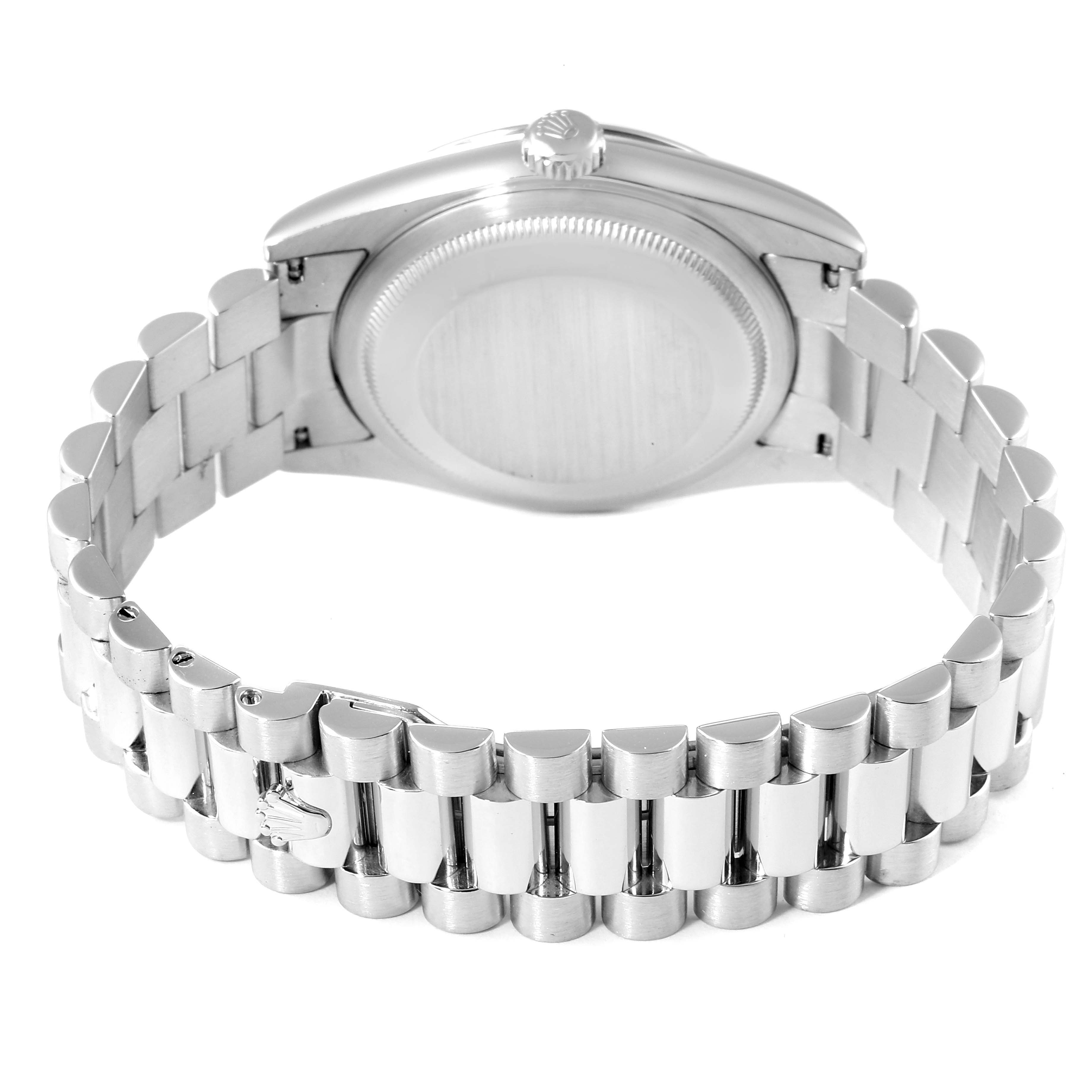 The image shows the back view of a Rolex President 118296 Men's Platinum Blue Dial 118296 Men's Platinum Blue Dial model watch, highlighting its case back and the iconic President bracelet.