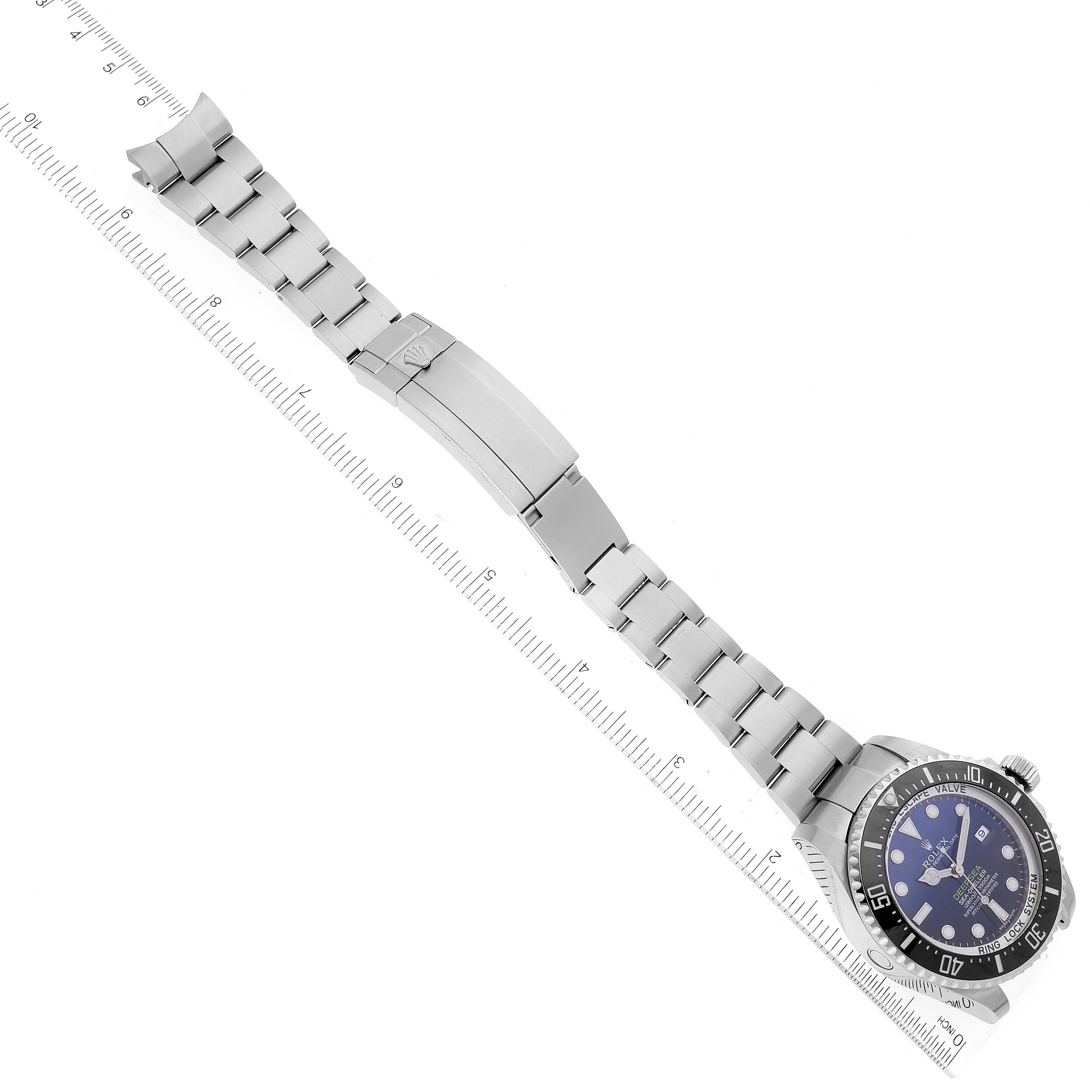 The Rolex Sea-Dweller 116660 Men's Stainless Steel Blue Dial 116660 Men's Stainless Steel Blue Dial watch is shown from an above angle, displaying the face, bezel, bracelet, and clasp.