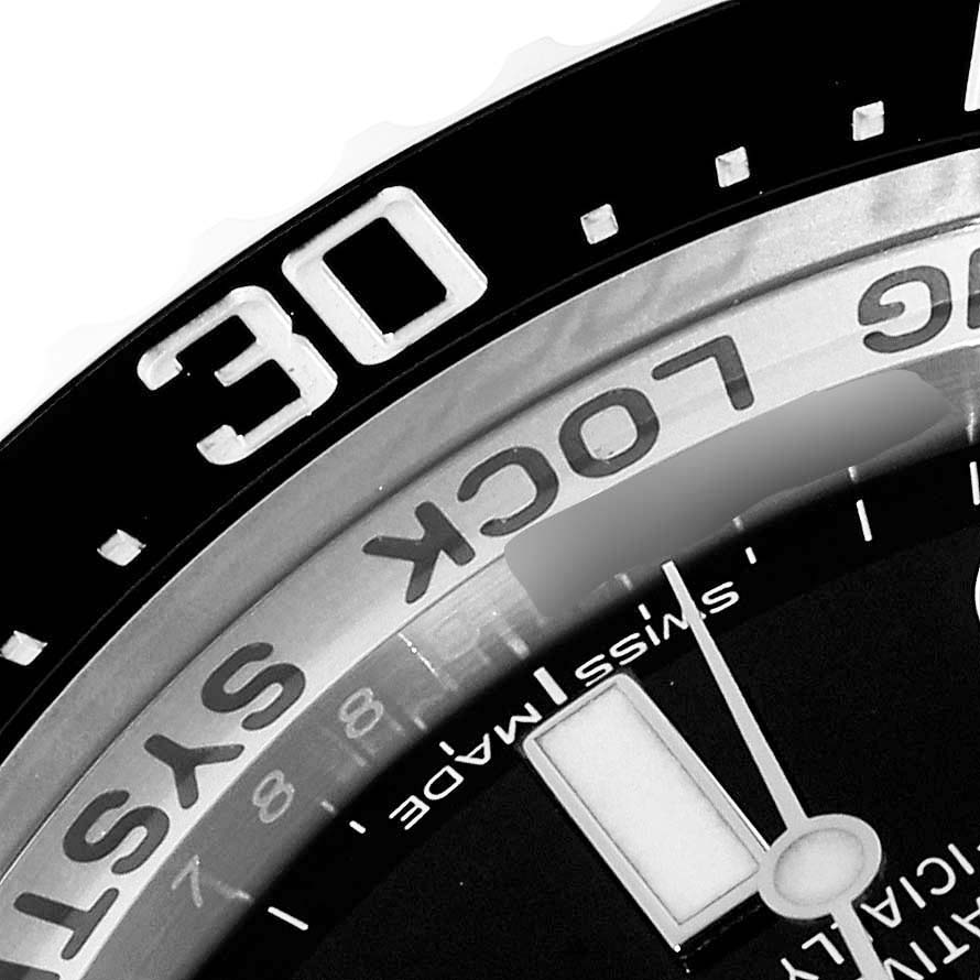 This image shows a close-up of the bezel, part of the dial, and the Swiss-made inscription of a Rolex Sea-Dweller 116660 Men's Stainless Steel Blue Dial 116660 Men's Stainless Steel Blue Dial watch.