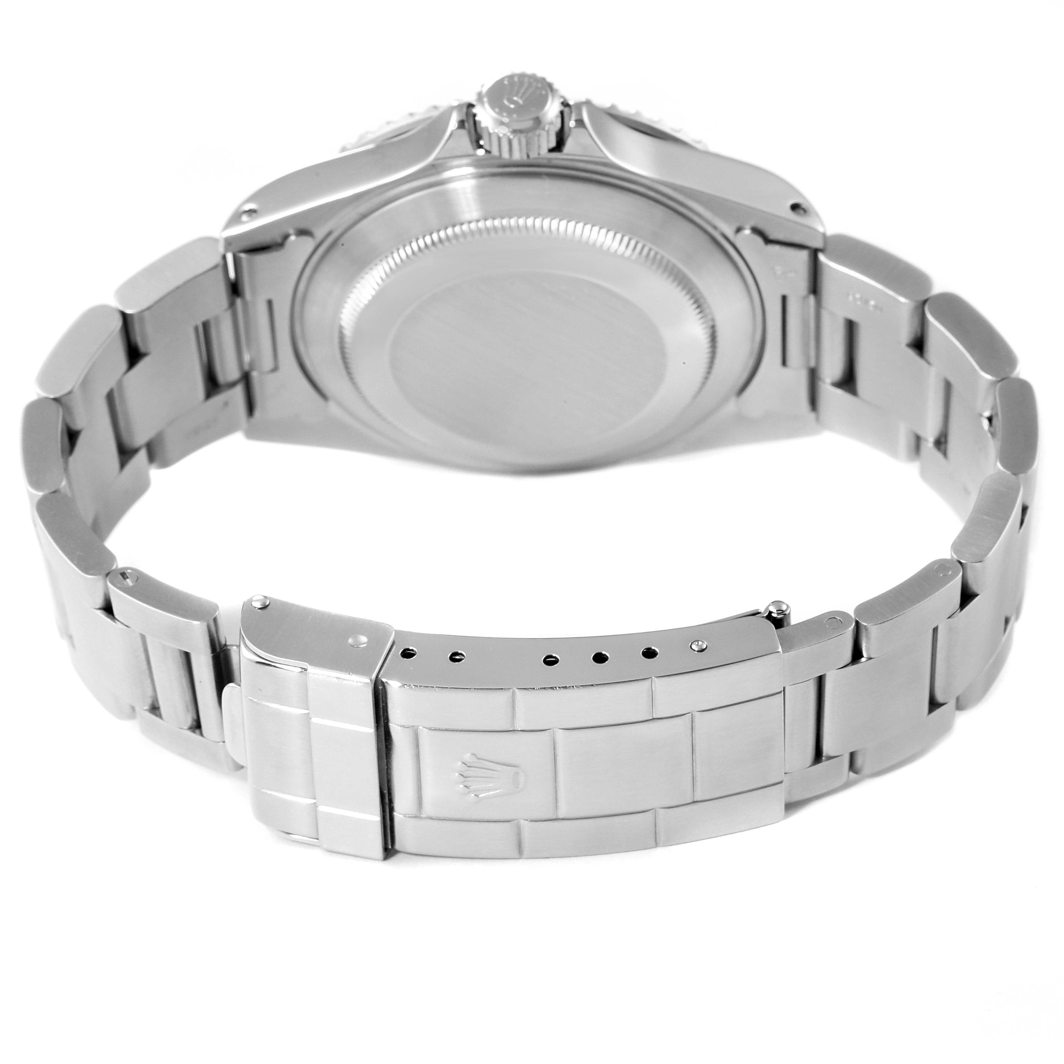 This image shows the back case, crown, and clasp of a Rolex Submariner 14060 Men
s Stainless Steel Black Dial 14060 Men
s Stainless Steel Black Dial watch from a rear angle.