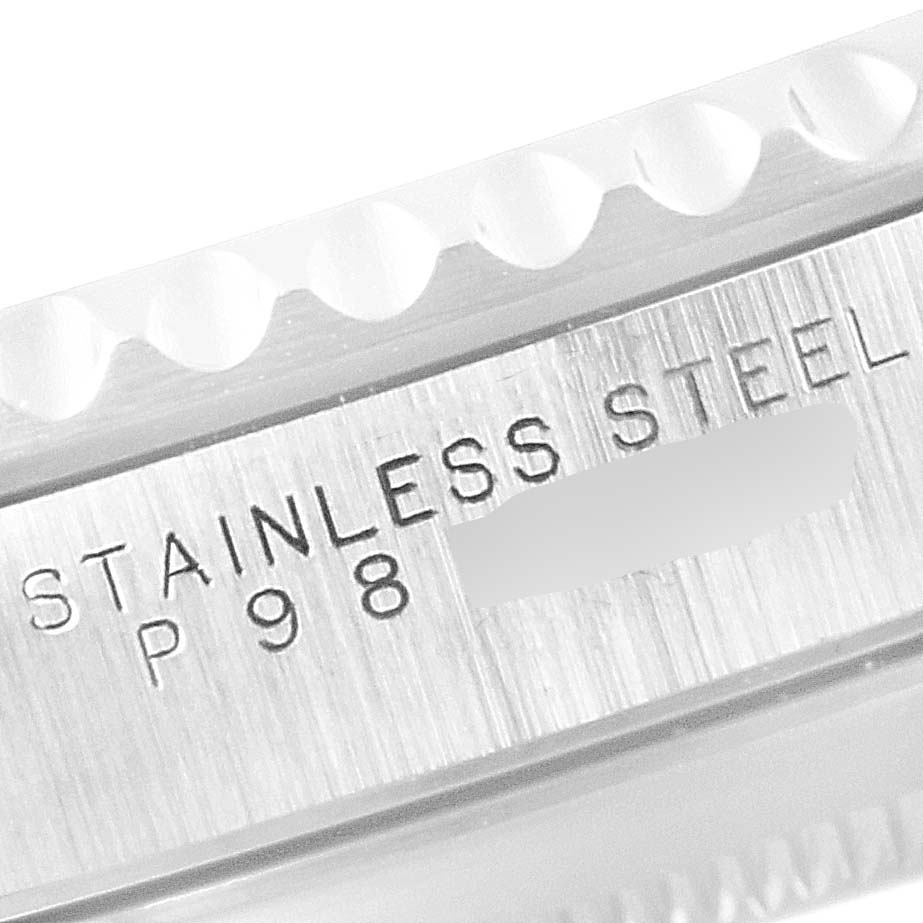 This image shows a close-up of the stainless steel bezel and engraved text on a Rolex Submariner 14060 Men
s Stainless Steel Black Dial 14060 Men
s Stainless Steel Black Dial watch.