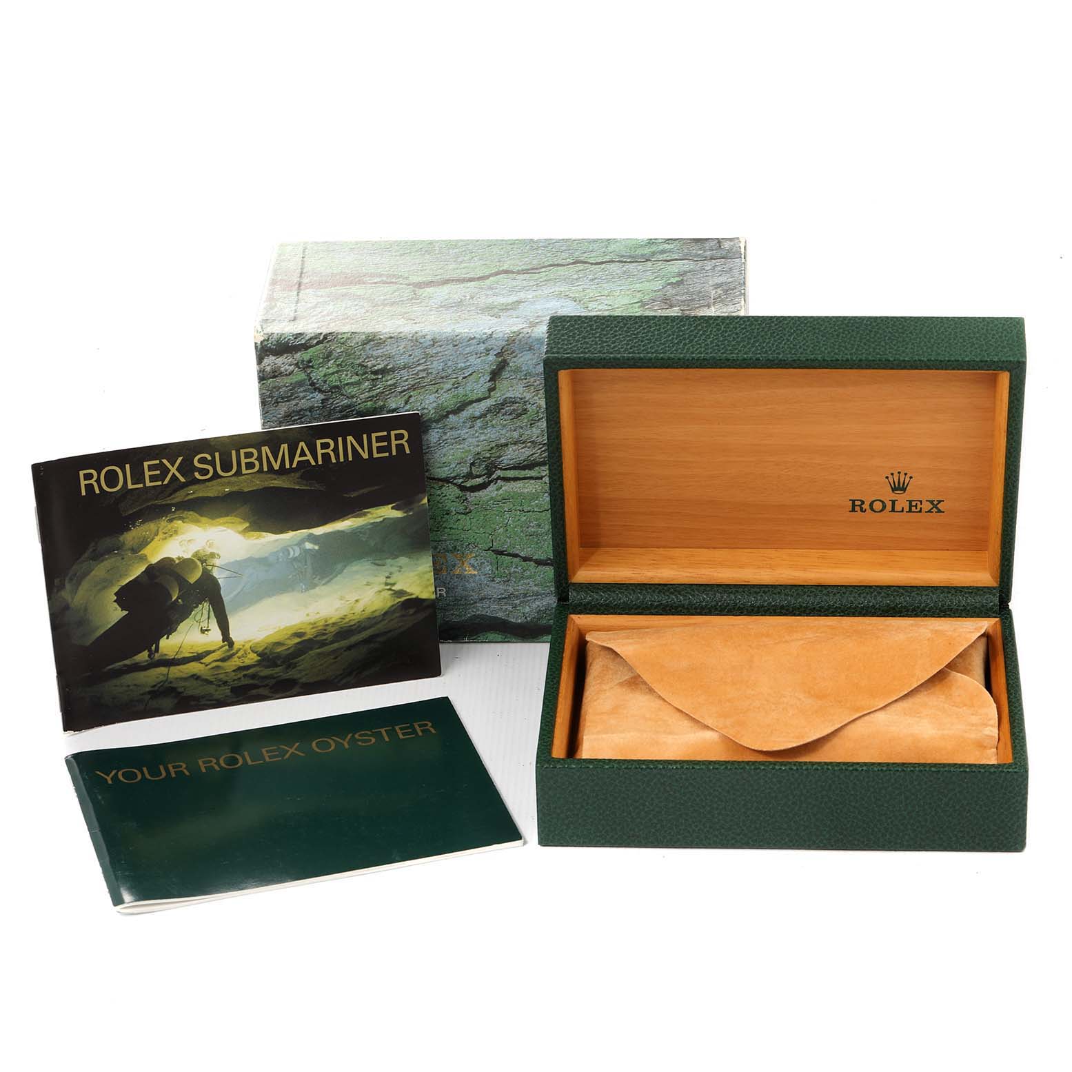 The image shows the accessories of a Rolex Submariner 14060 Men
s Stainless Steel Black Dial 14060 Men
s Stainless Steel Black Dial, including the watch box, manuals, and outer packaging, viewed from above.